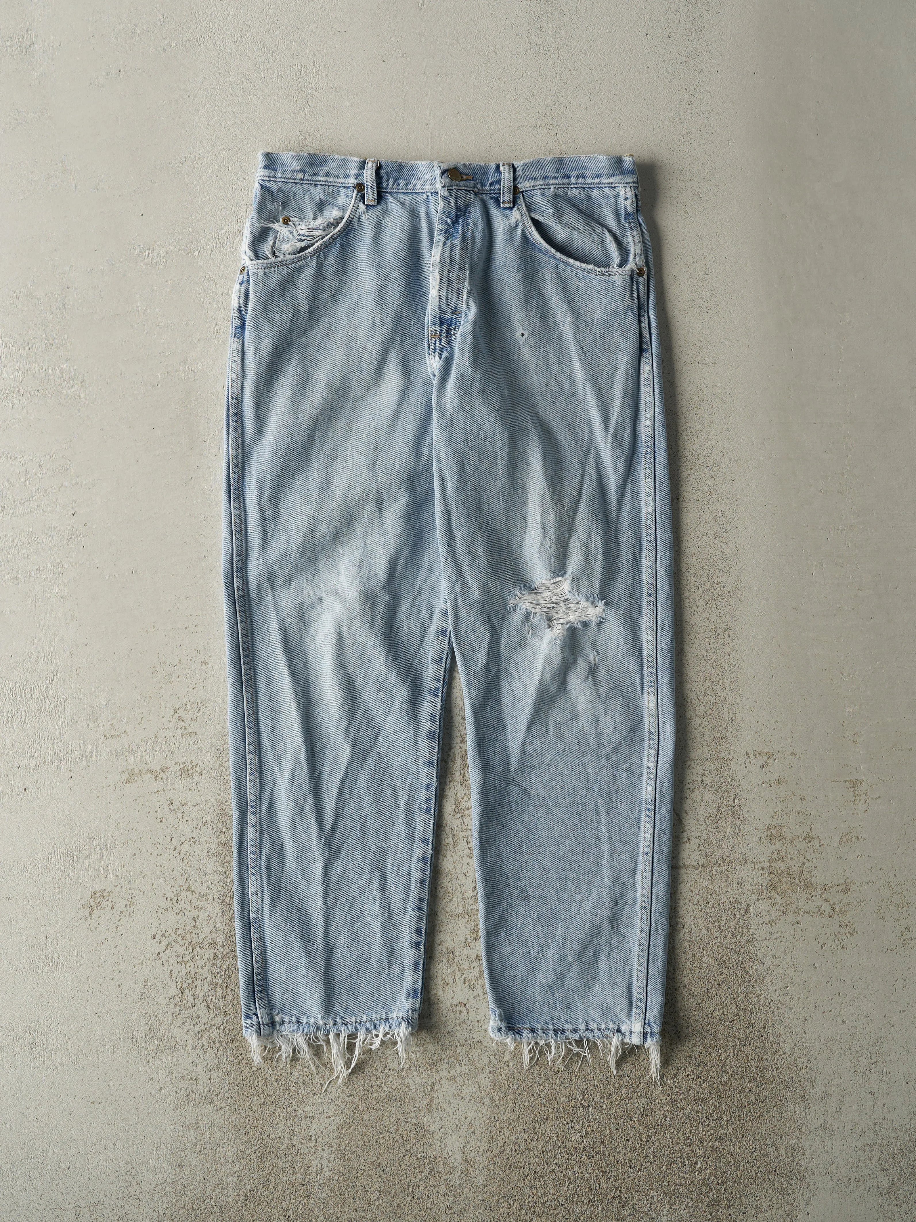 Vintage 90s Light Wash Wrangler Jeans (34x28) sold by Rebalance Vintage