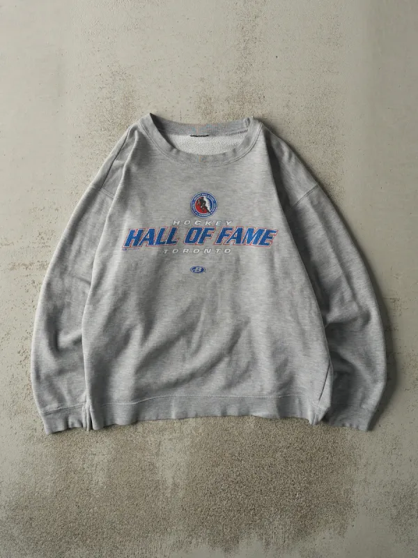 Vintage Y2K Grey Hockey Hall Of Fame Toronto Crewneck (L) sold by Rebalance Vintage