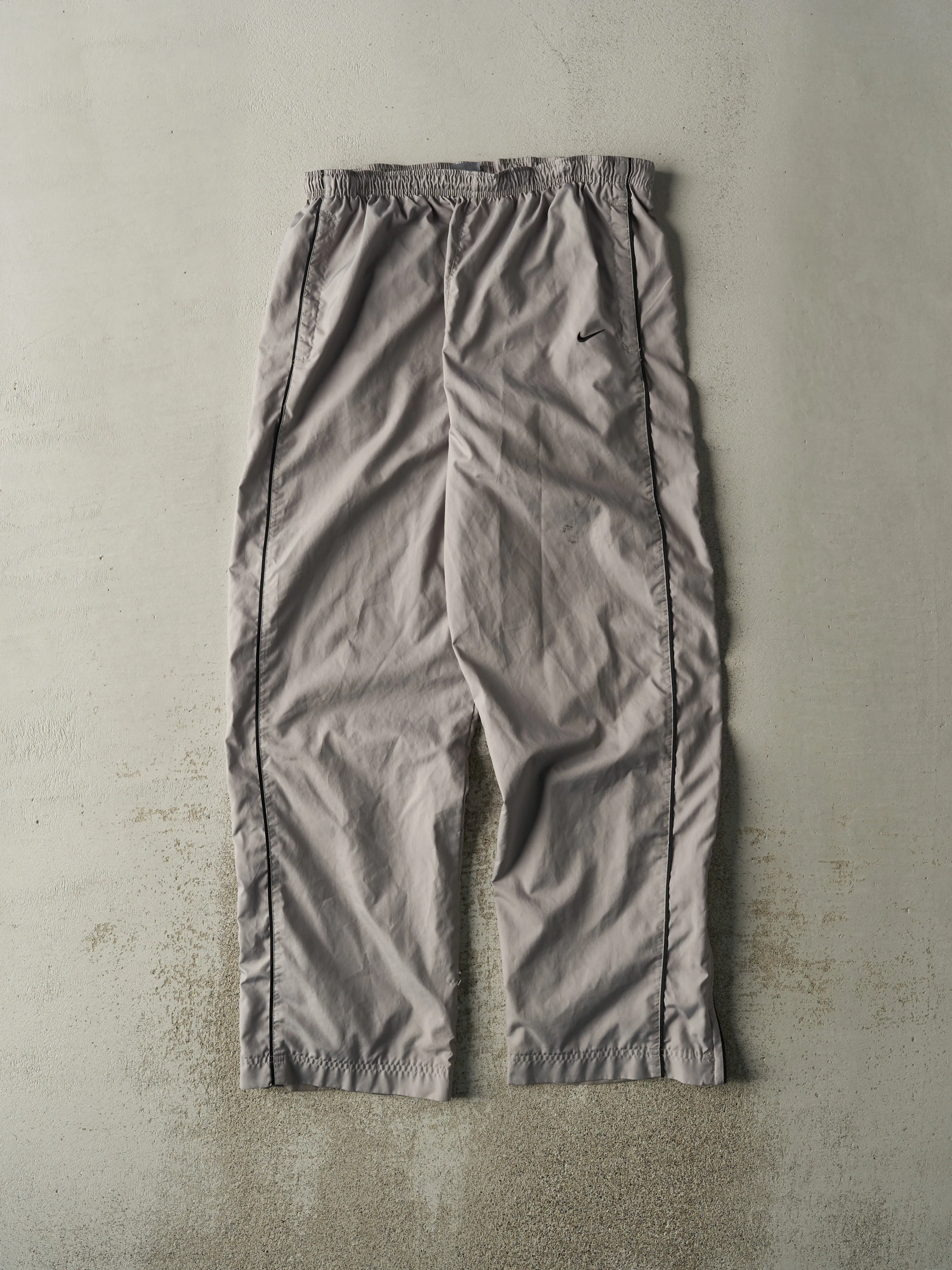 Vintage Y2K Grey Nike Windbreaker Pants (33x32.5) sold by Rebalance Vintage