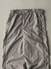 Vintage Y2K Grey Nike Windbreaker Pants (33x32.5) sold by Rebalance Vintage