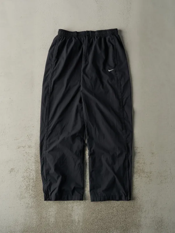 Vintage Y2K Black Nike Windbreaker Pants (30x30) sold by Rebalance Vintage
