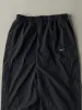 Vintage Y2K Black Nike Windbreaker Pants (30x30) sold by Rebalance Vintage