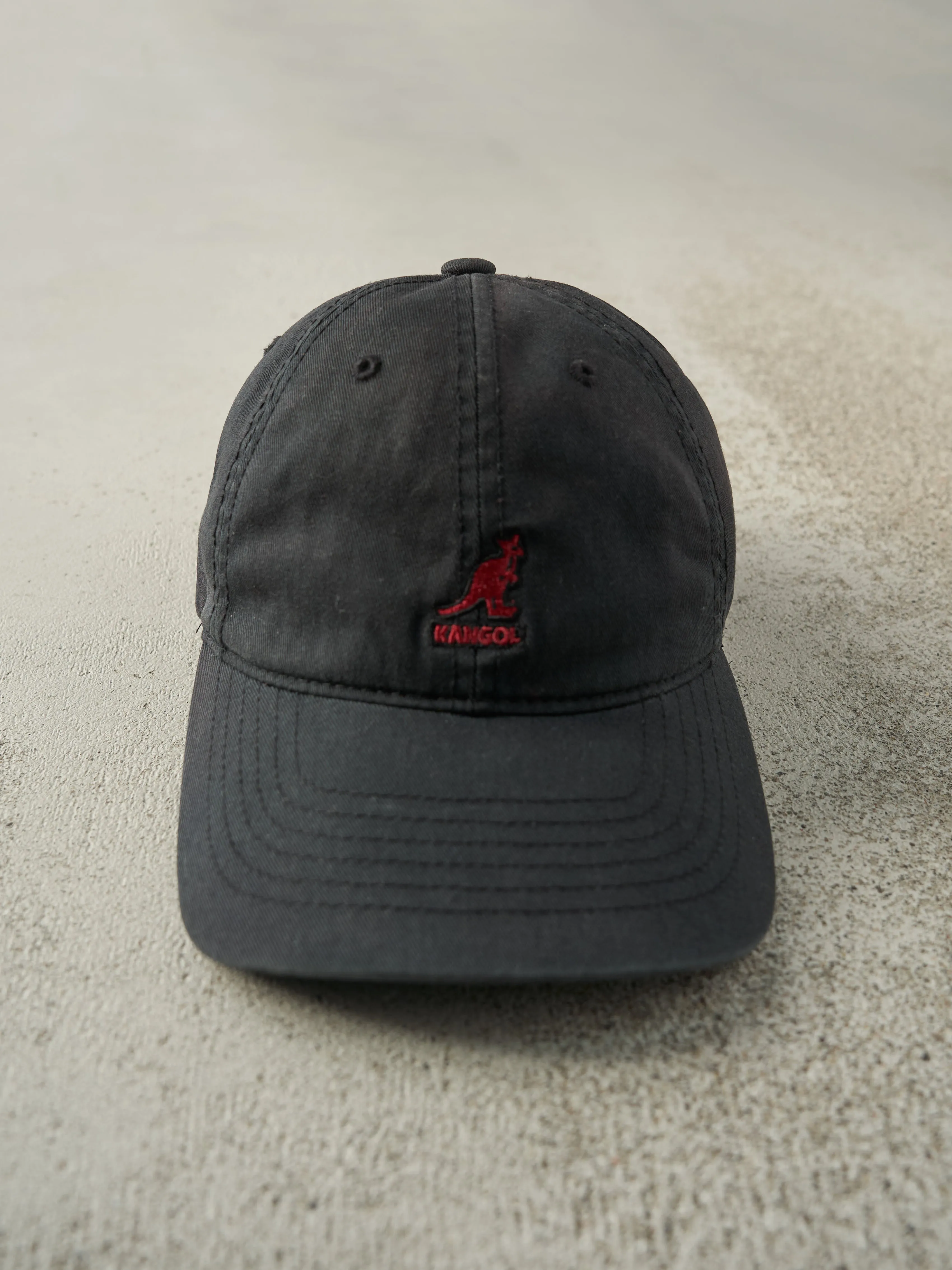 Vintage 90s Black Embroidered Kangol Leather Strap Back Hat sold by Rebalance Vintage