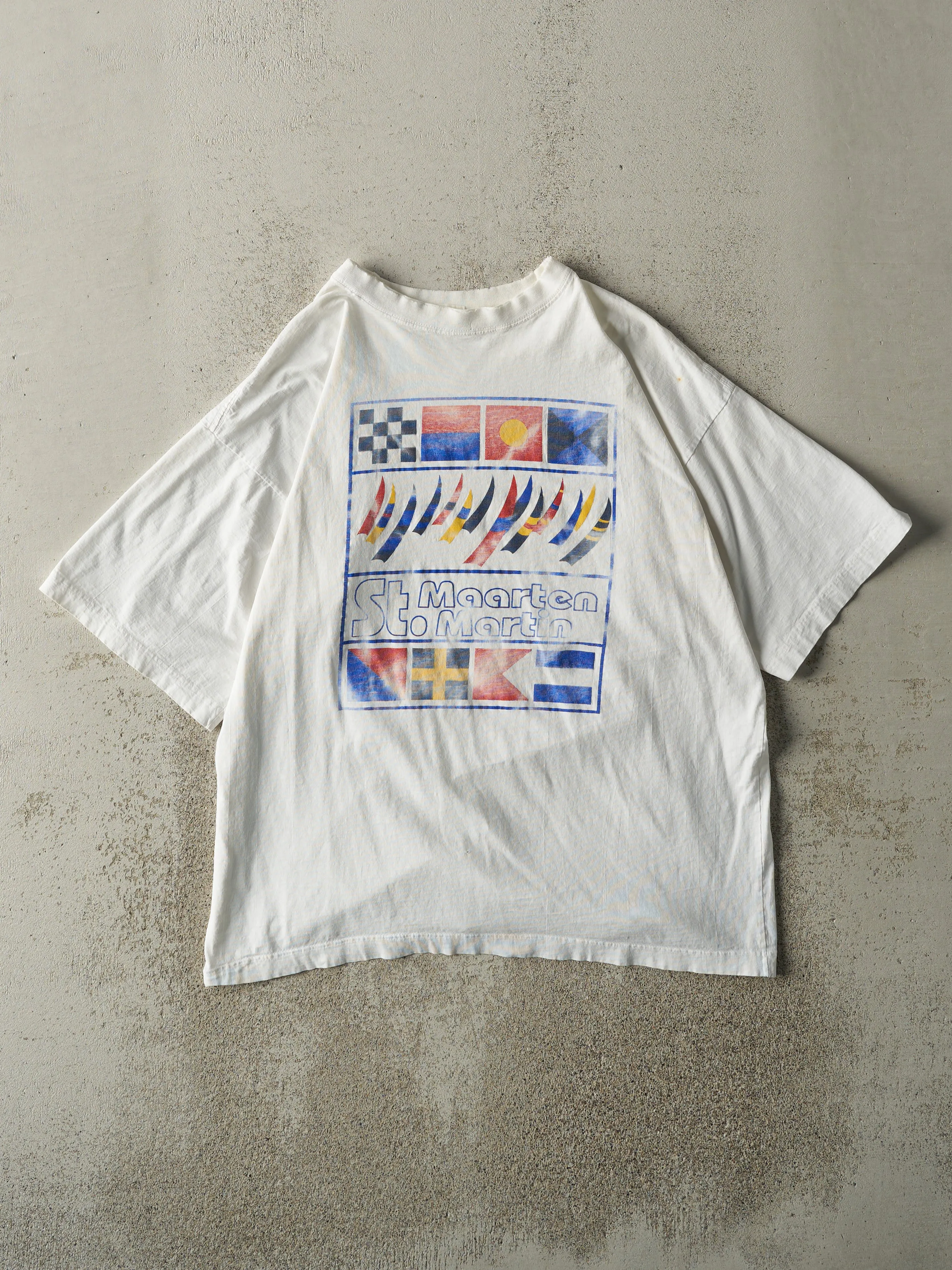 Vintage 90s White St. Maarten Tee (L) sold by Rebalance Vintage