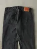Vintage Y2K Faded Black Levi's 505 Denim Pants (32x28.5) sold by Rebalance Vintage