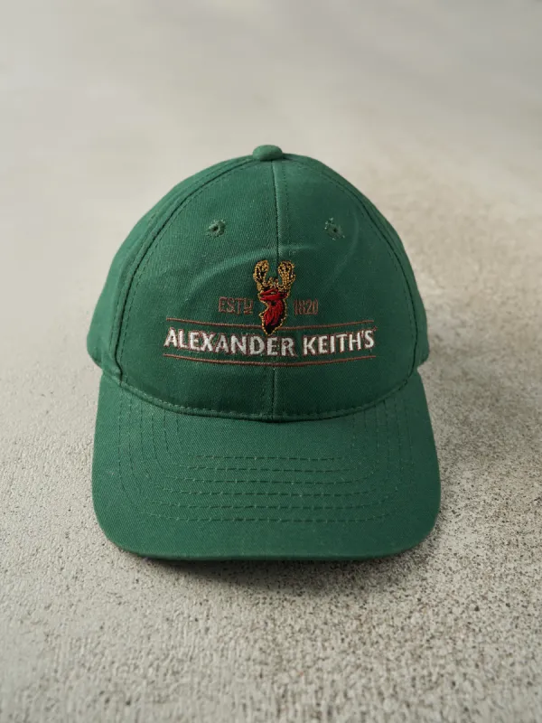 Vintage 90s Green Alexander Keiths Embroidered Velcro Back Hat sold by Rebalance Vintage
