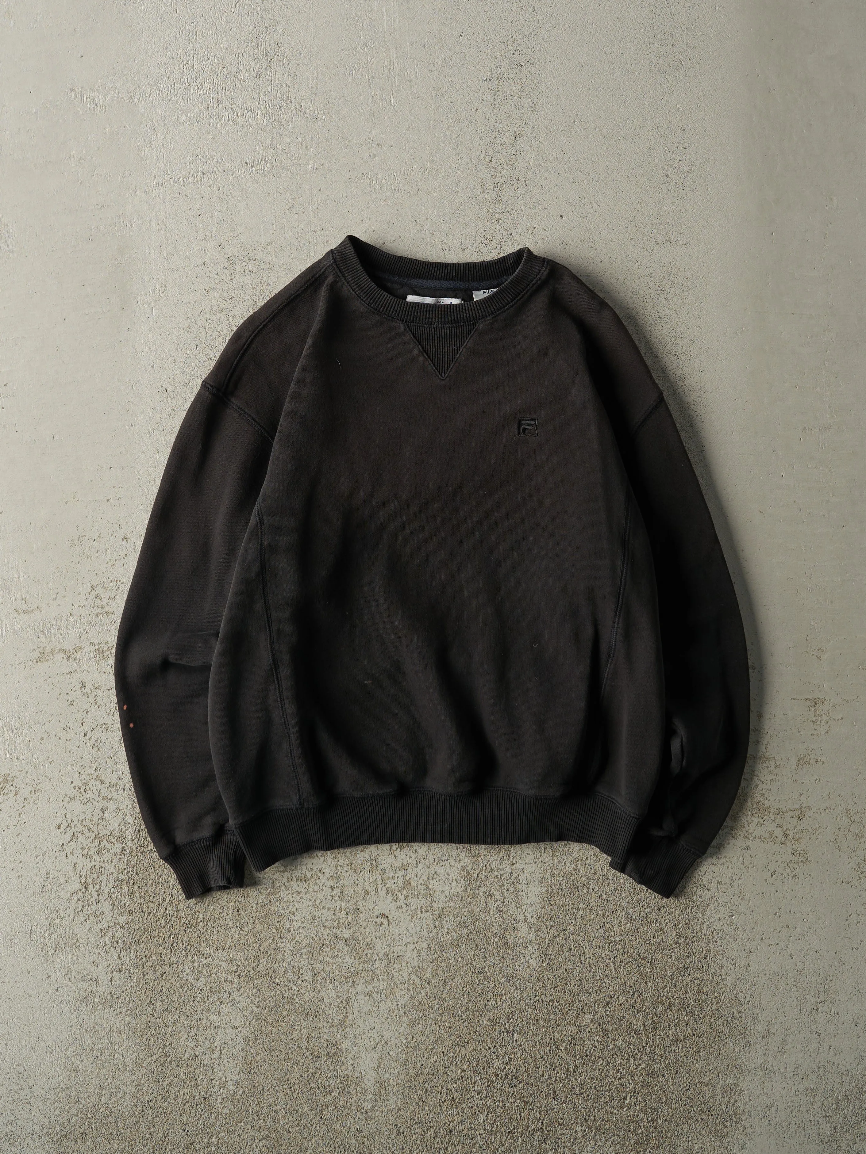 Vintage Y2K Black Embroidered Fila Crewneck (M) sold by Rebalance Vintage