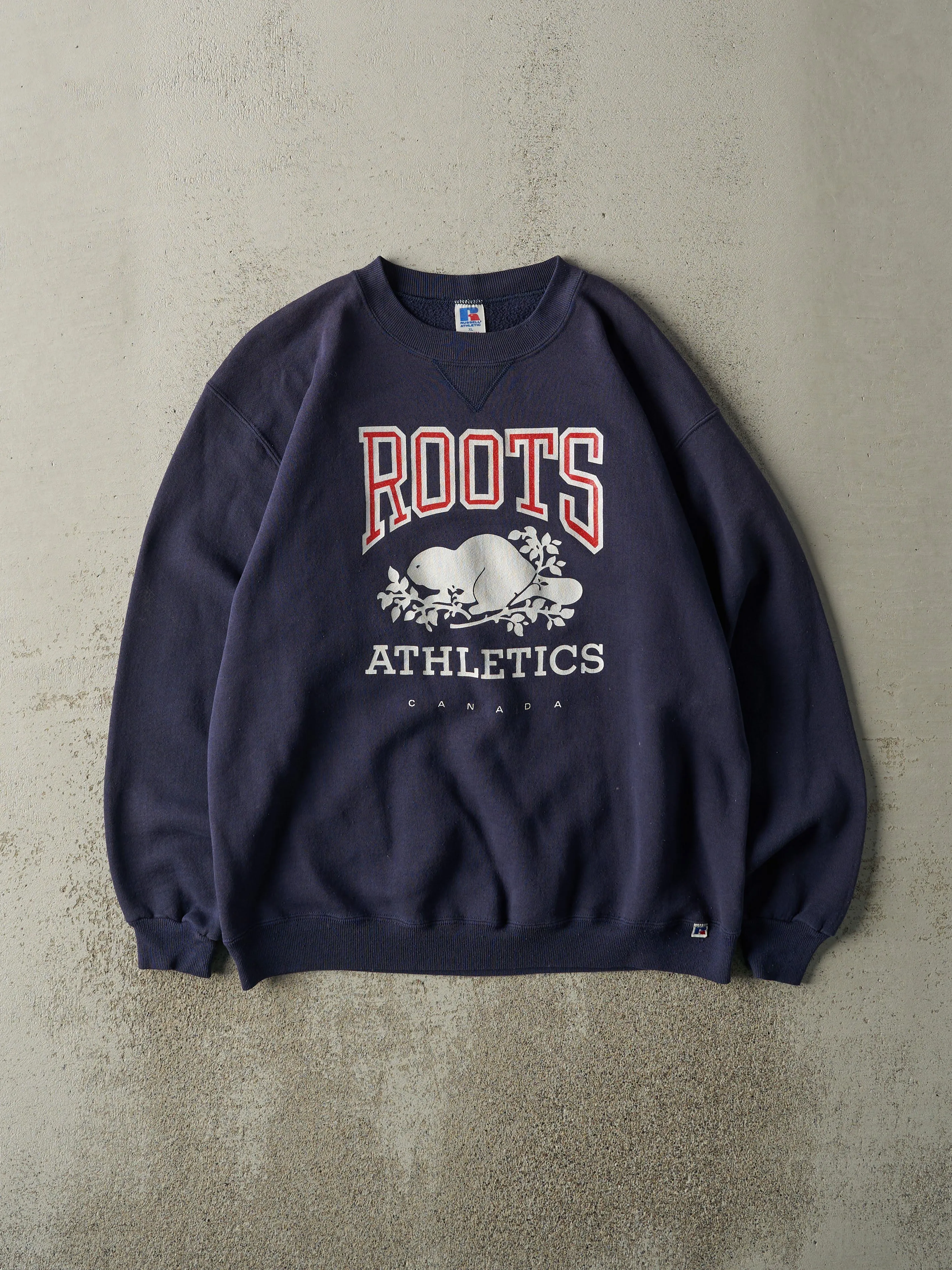 Vintage 90s Navy Blue Russell Athletic Roots Crewneck (L) sold by Rebalance Vintage