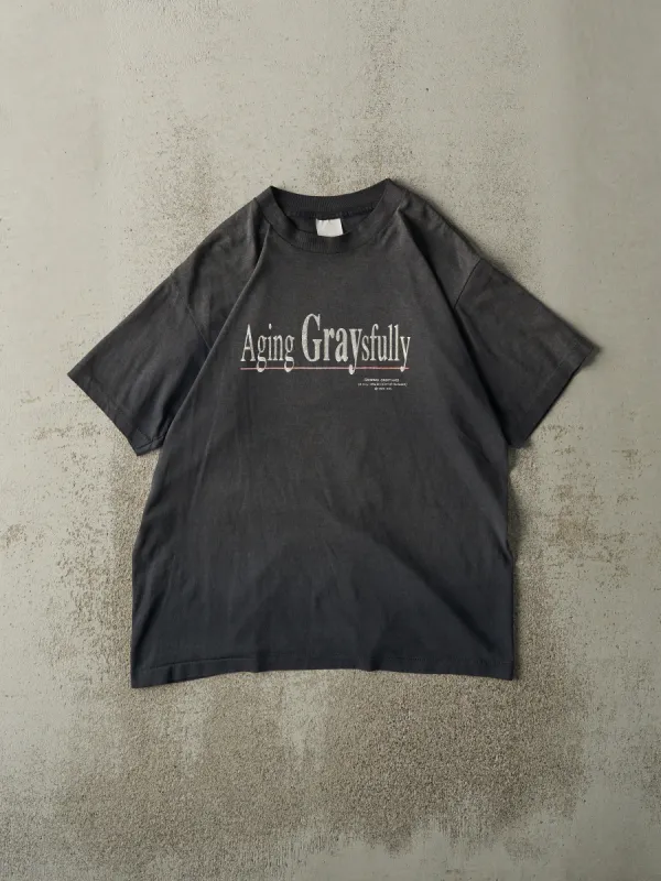 Vintage 90s Faded Black "Aging Graysfully" Slogan Single Stitch Tee (M) sold by Rebalance Vintage
