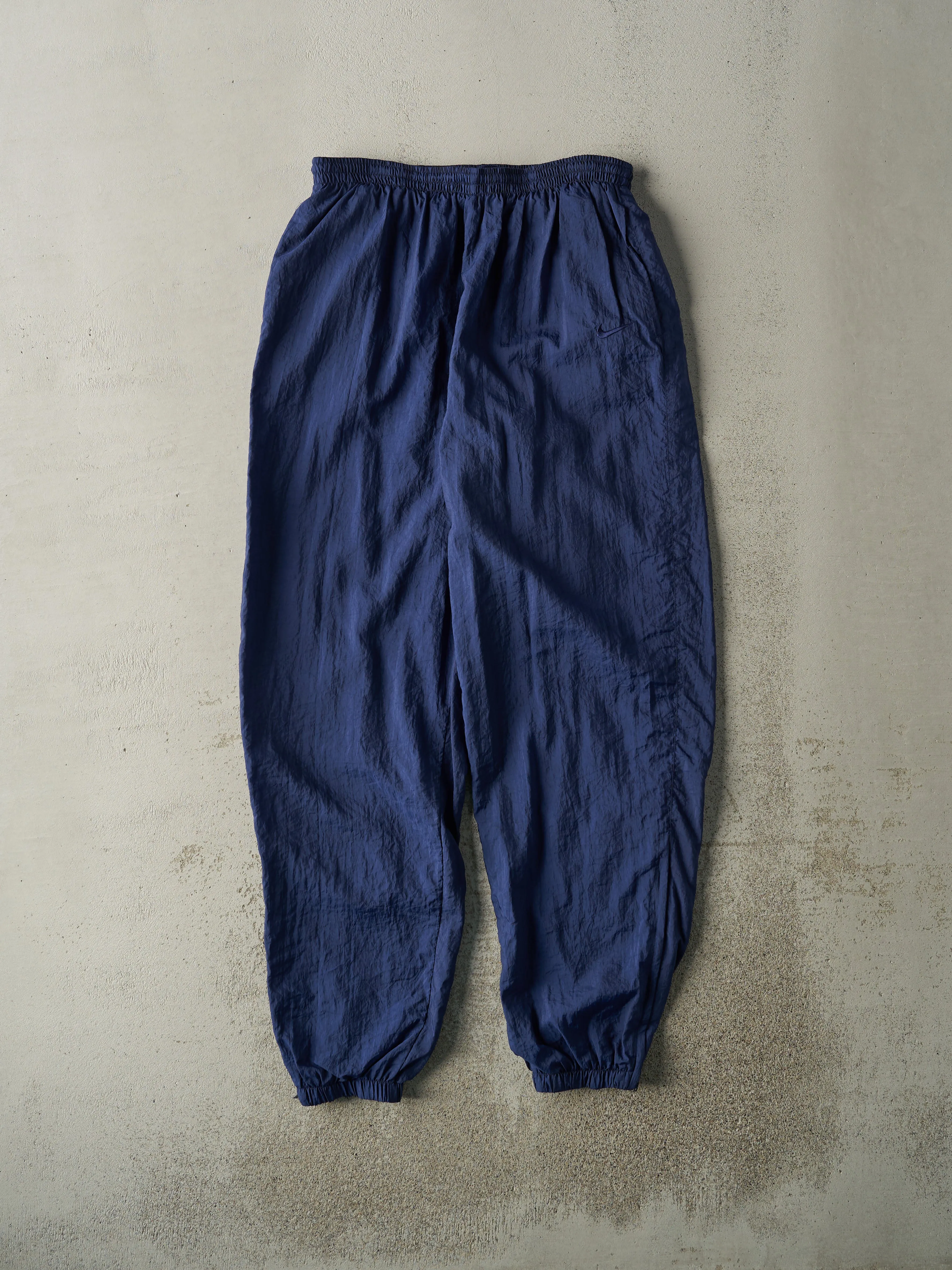 Vintage 90s Navy Blue Nike Windbreaker Pants (31x32.5) sold by Rebalance Vintage