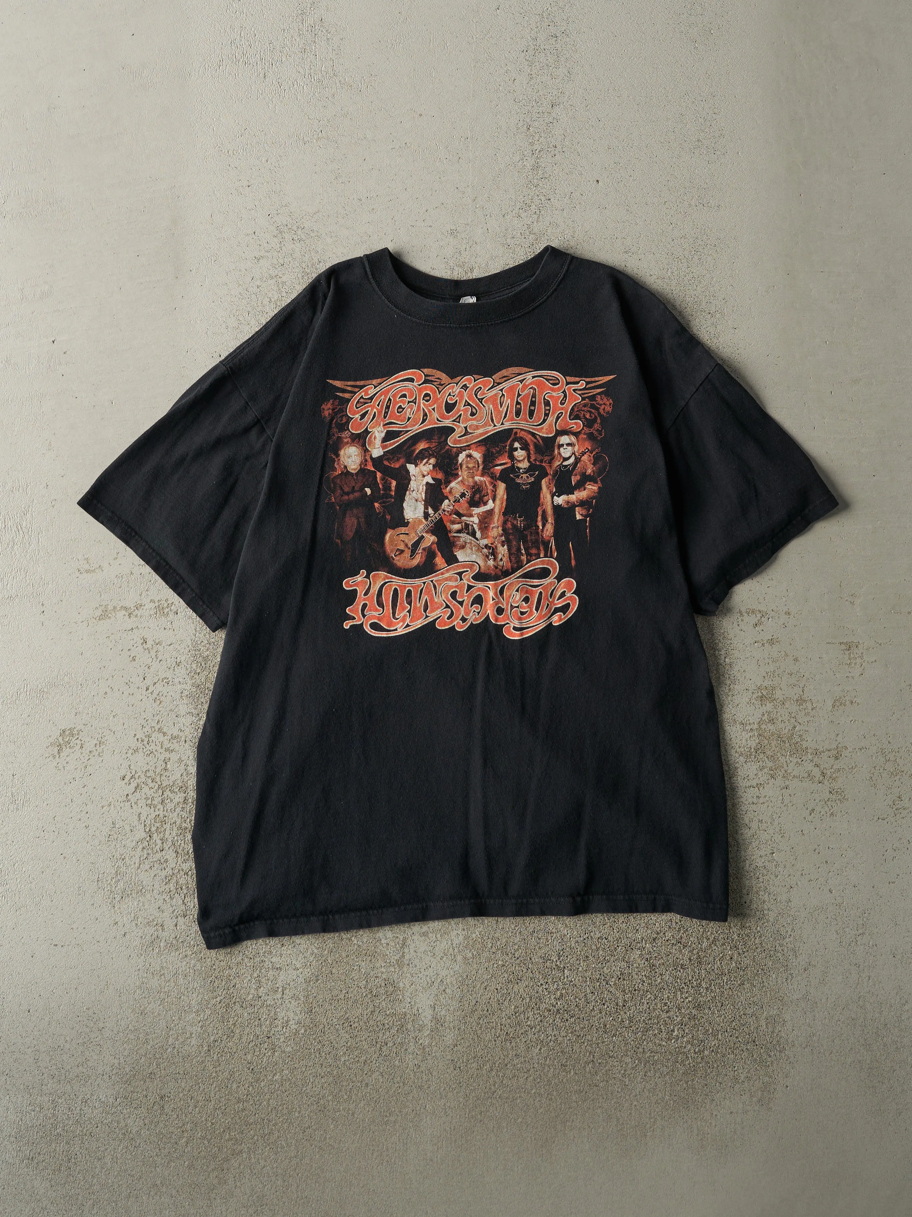 Vintage 07' Black Aerosmith Tour Tee (L) sold by Rebalance Vintage