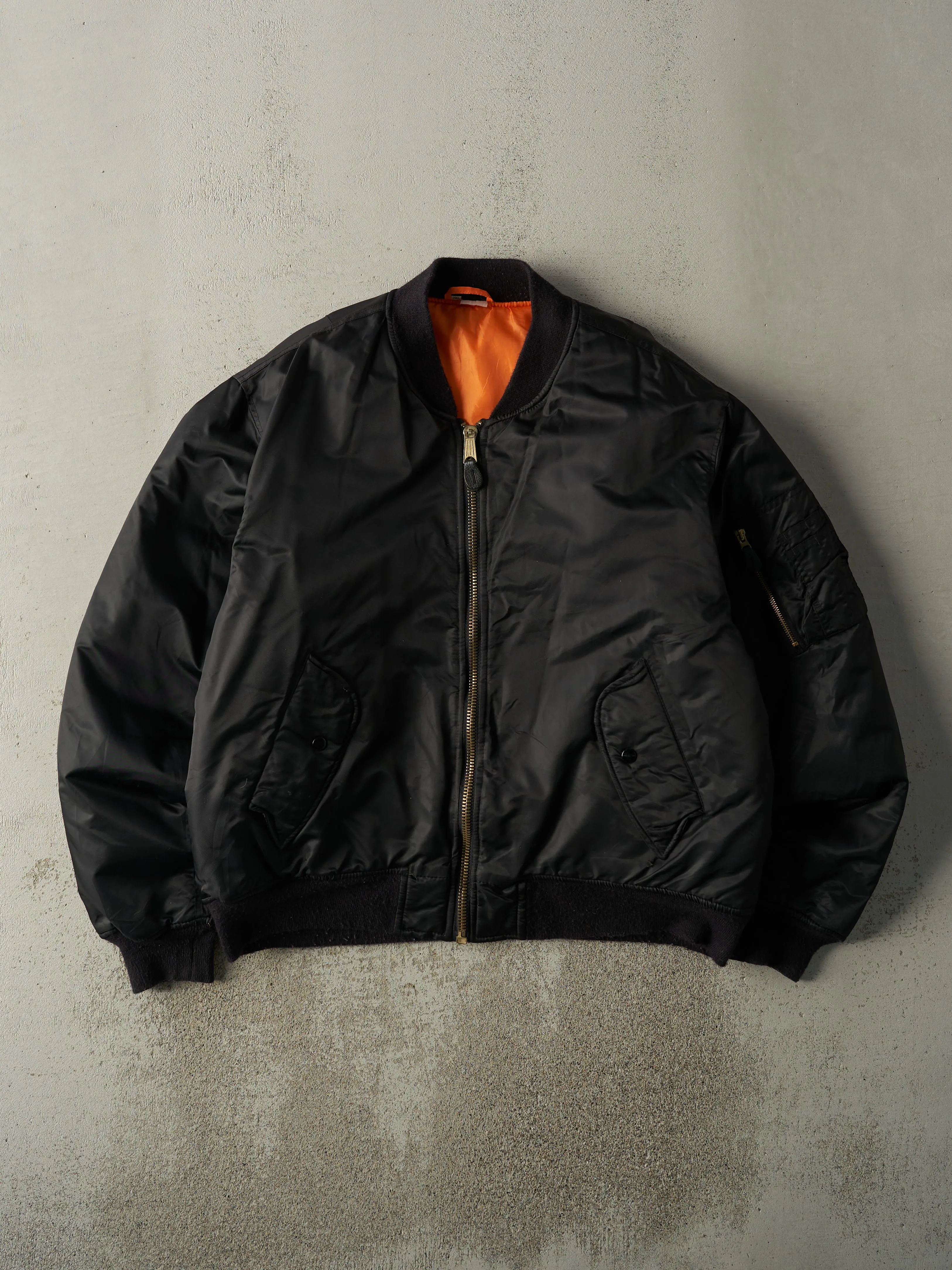 Vintage 90s Black & Orange Reversible Bomber Flight Jacket (XL) sold by Rebalance Vintage