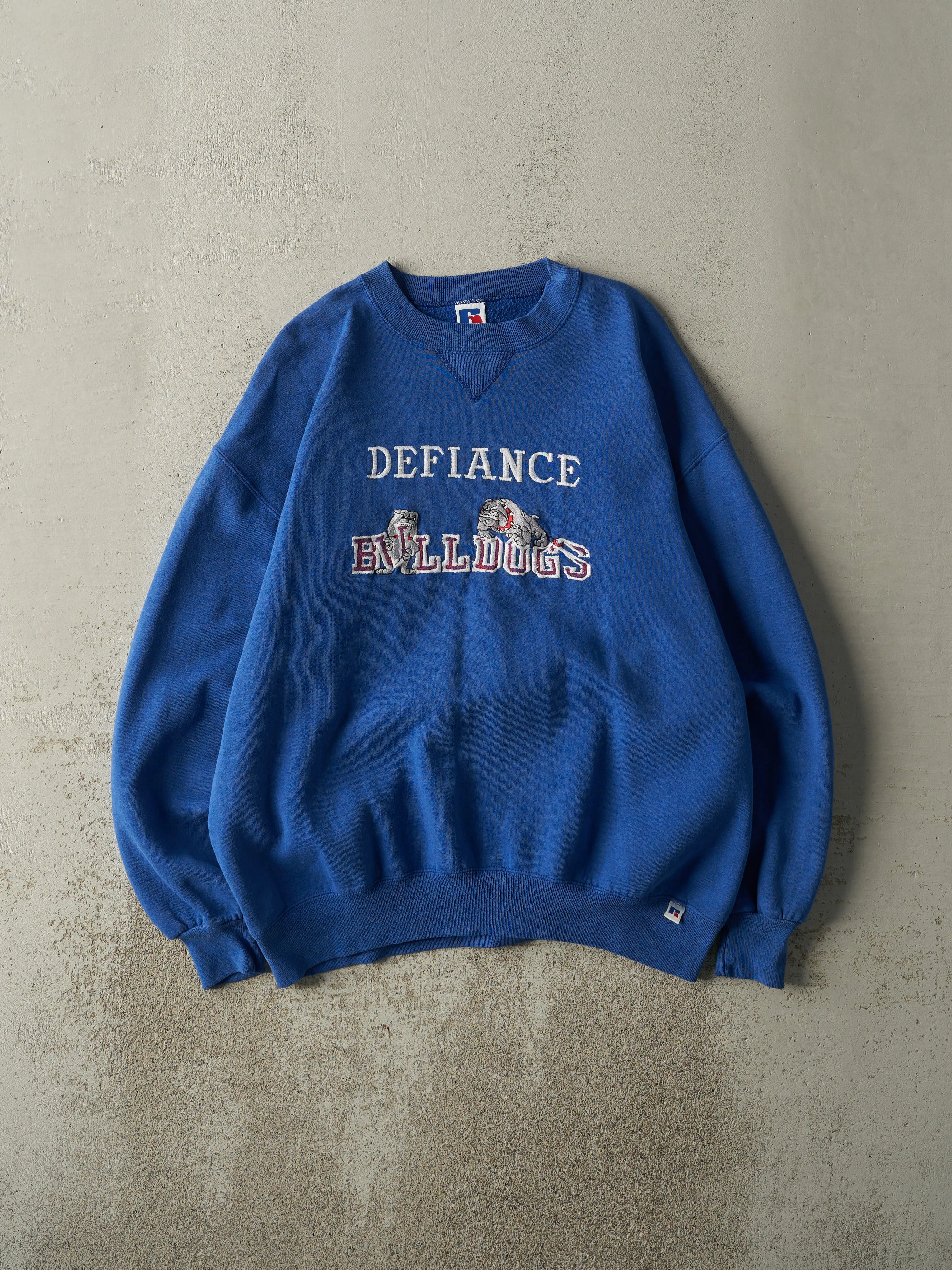 Vintage 90s Blue Embroidered Defiance Bulldogs Russell Athletic Crewneck (L/XL) sold by Rebalance Vintage