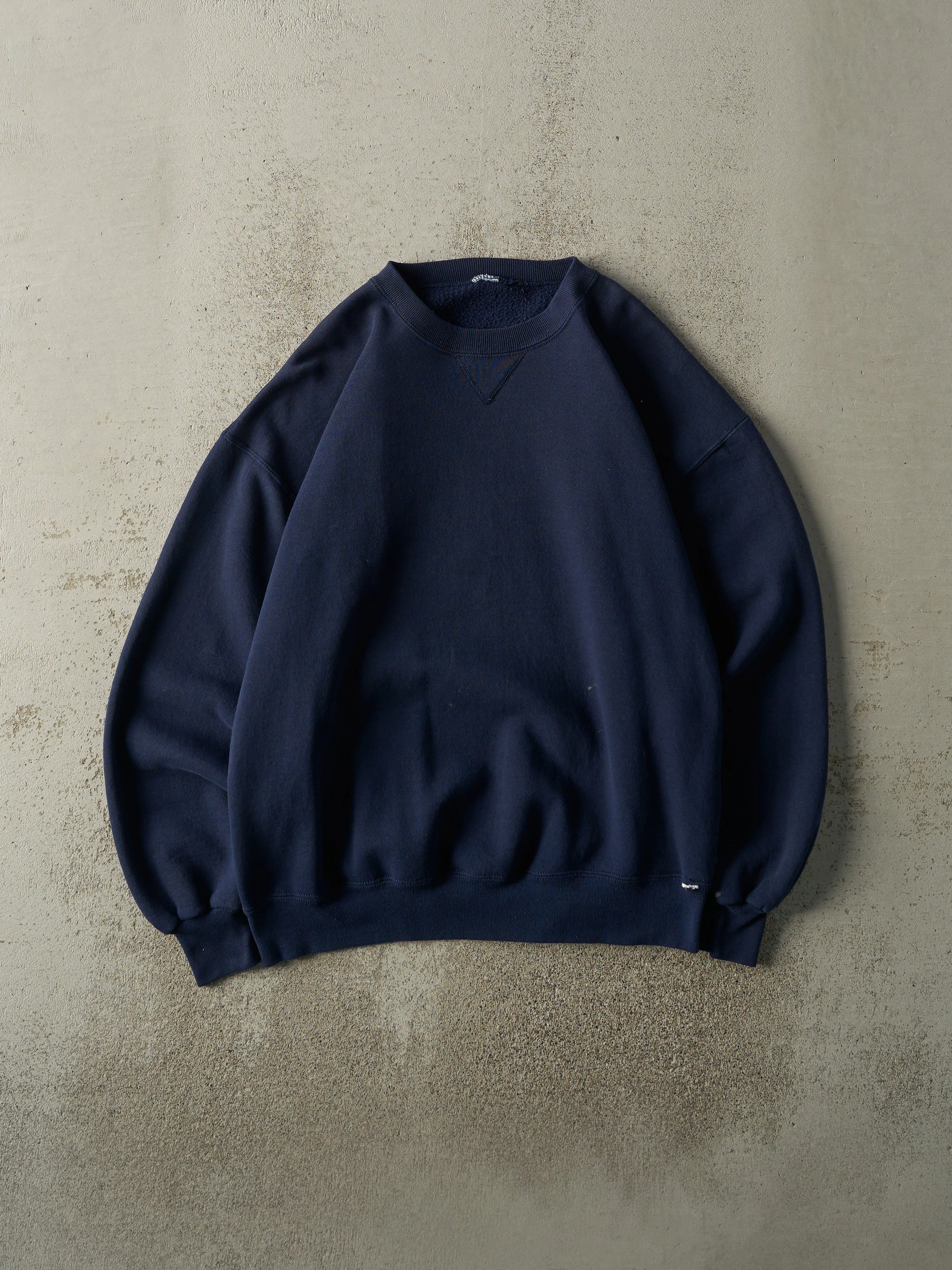 Vintage 90s Navy Blue Russell Athletic Blank Crewneck (L/XL) sold by Rebalance Vintage