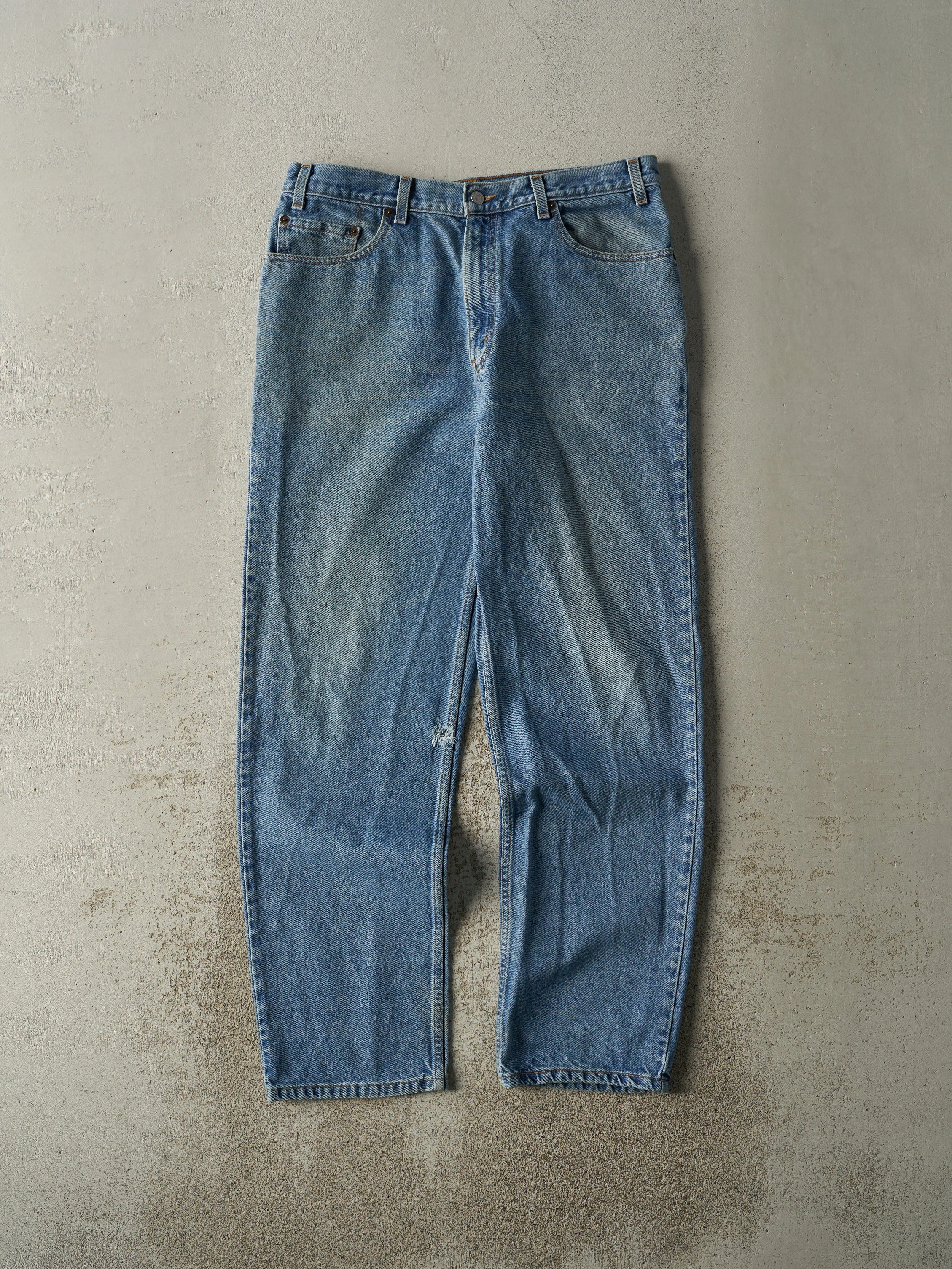 Vintage 90s Light Wash Levi's Relaxed Straight Leg Jeans (35x32) sold by Rebalance Vintage