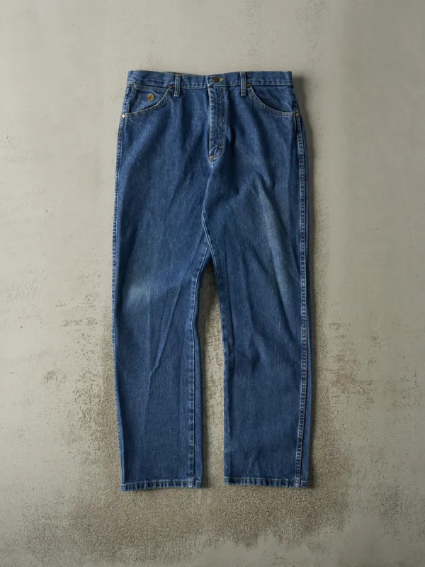 Vintage 90s Dark Wash Wrangler Jeans (35x32.5) sold by Rebalance Vintage