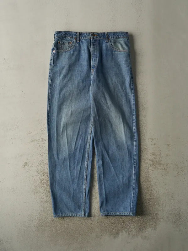 Vintage 90s Light Wash Levi's 550 Jeans (35x32) sold by Rebalance Vintage