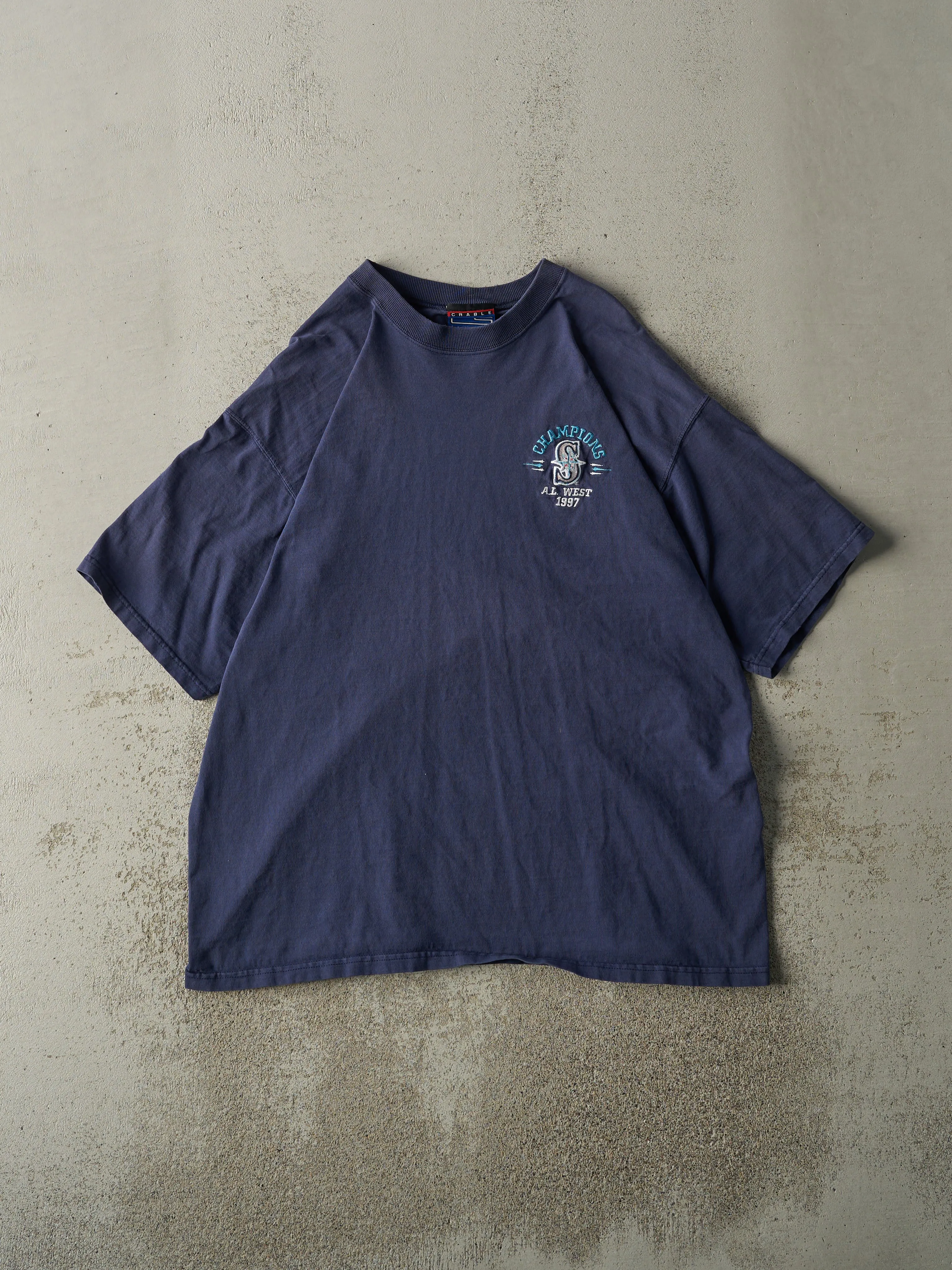 Vintage 97' Navy Blue Embroidered Al West Champions Seattle Mariners Tee (L) sold by Rebalance Vintage