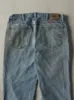 Vintage 90s Light Wash Wrangler Jeans (34x29) sold by Rebalance Vintage