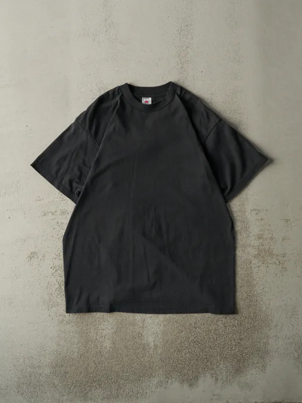 Vintage 90s Faded Black Blank Tee (L) sold by Rebalance Vintage