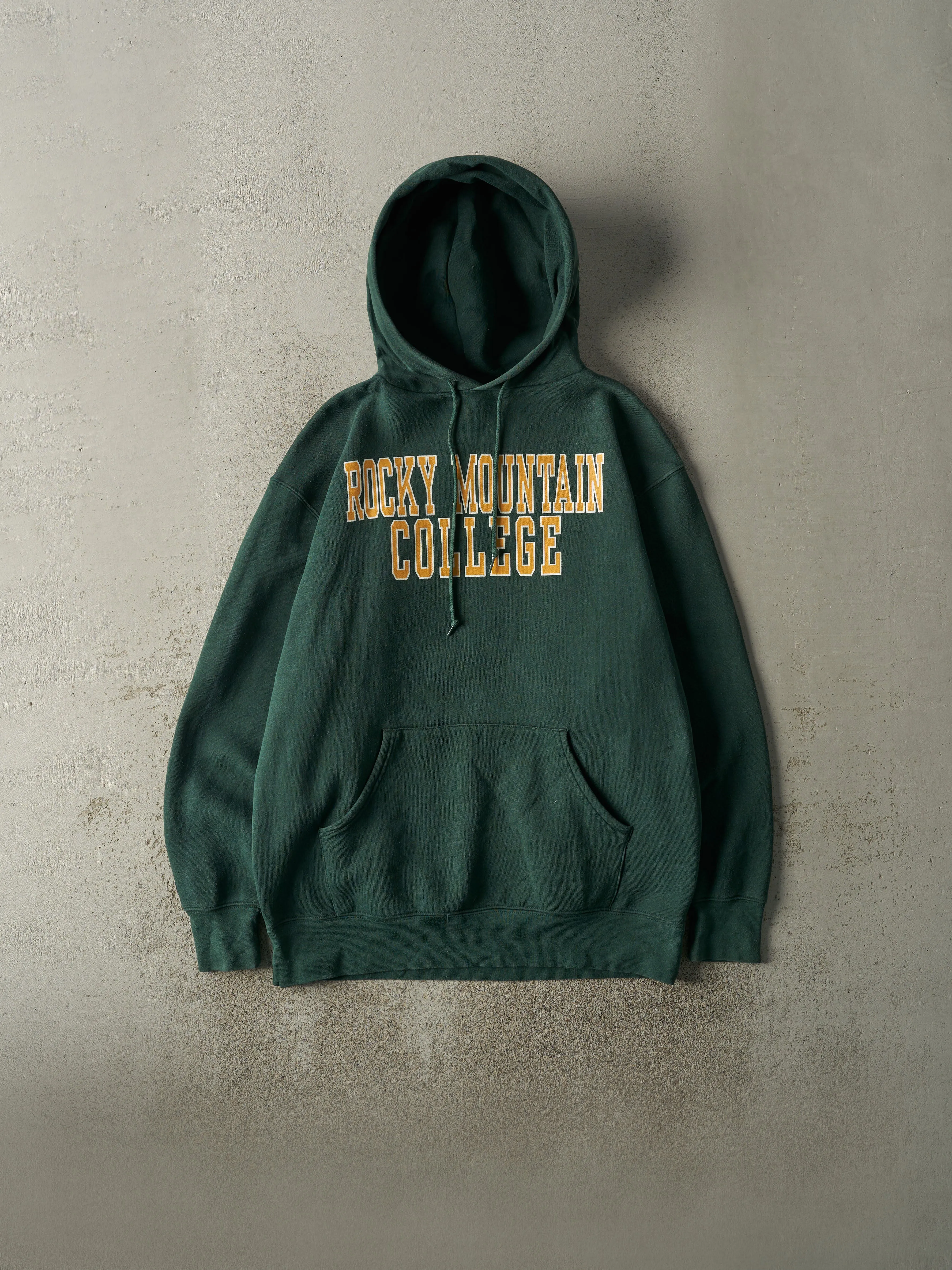 Vintage 90s Green Rocky Mountain College Hoodie (XL) sold by Rebalance Vintage