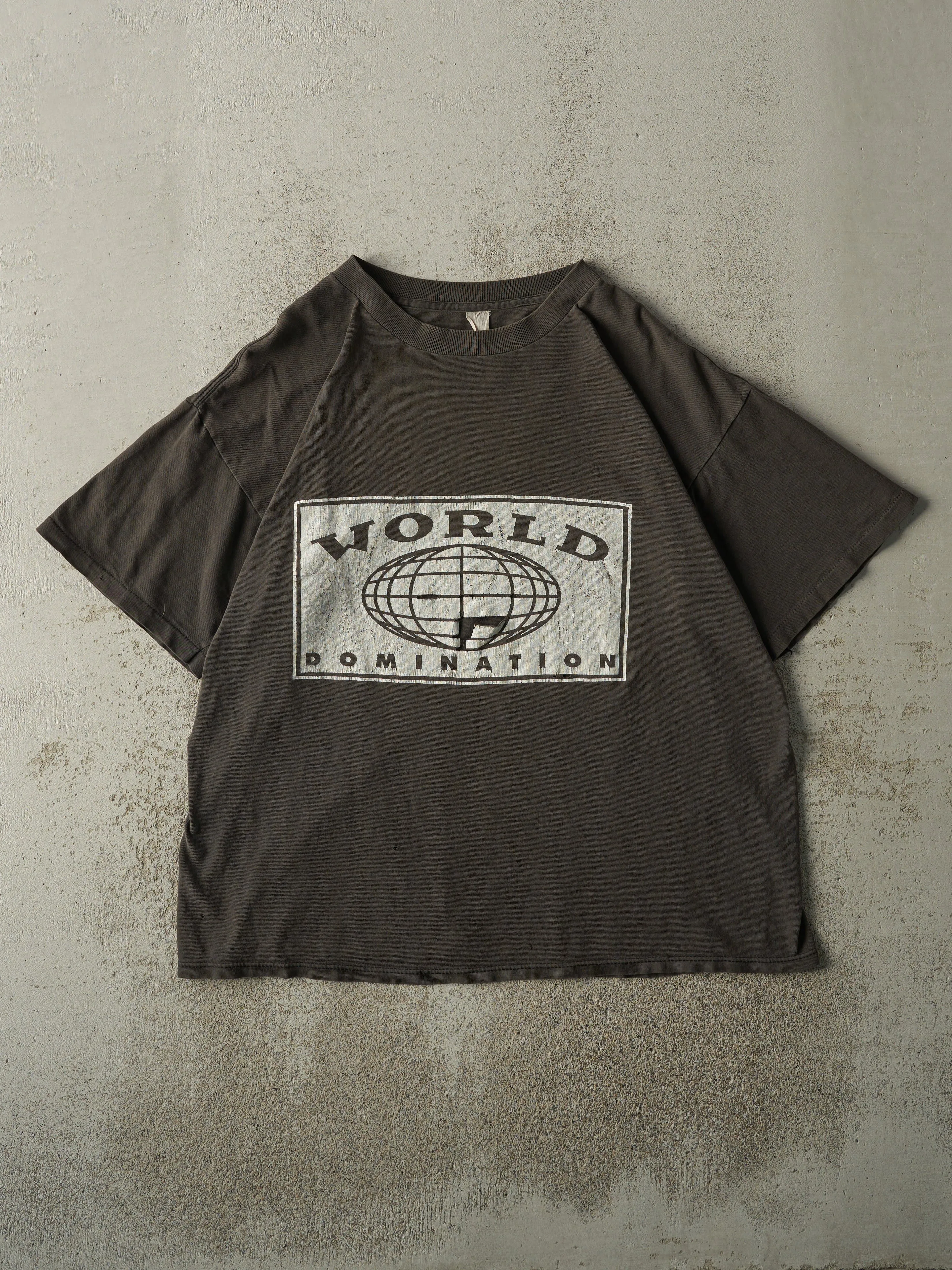 Vintage 90s Brown World Domination Tee (M/L) sold by Rebalance Vintage