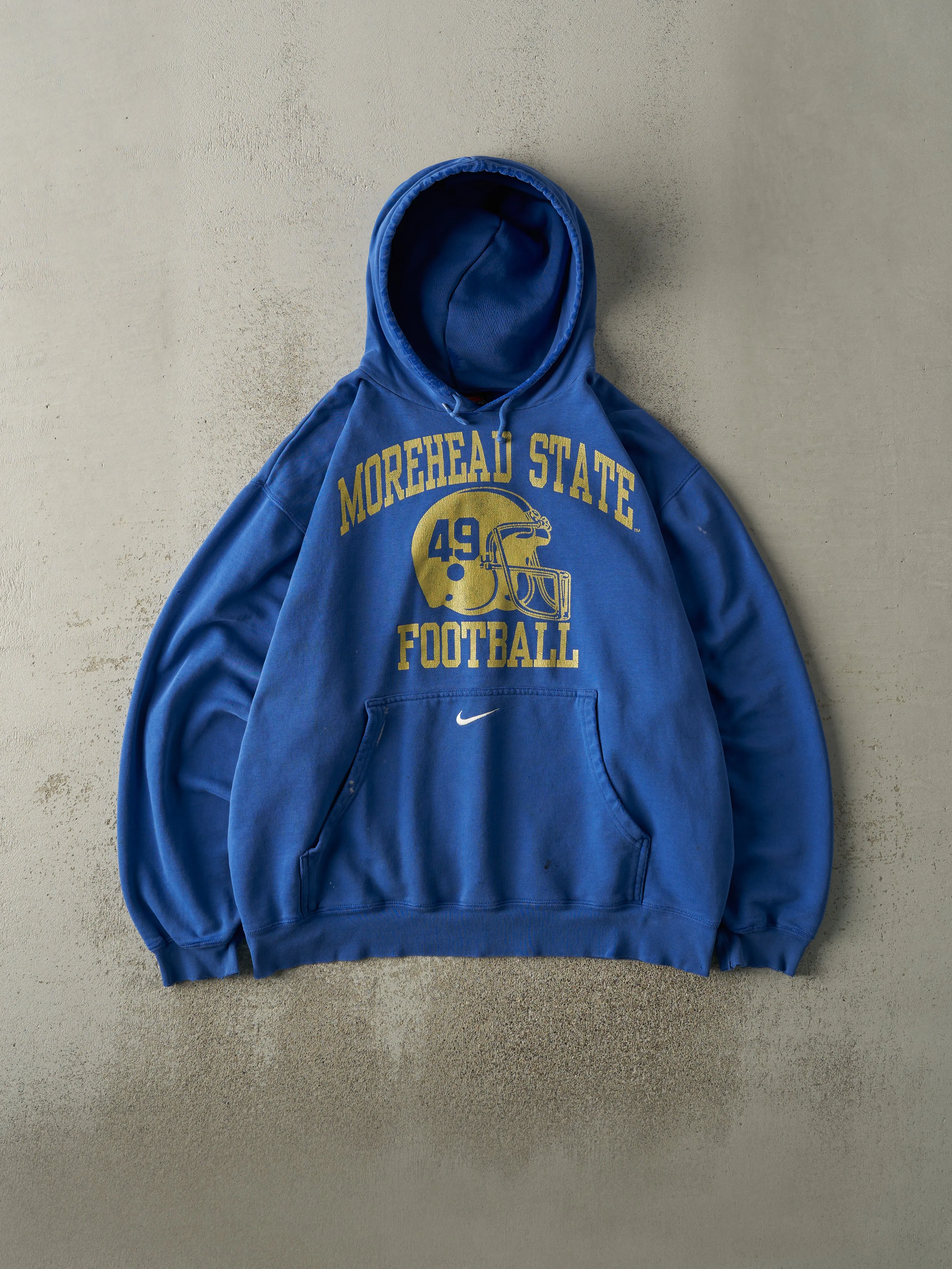 Vintage 90s Blue Nike Morehead State Football Hoodie (XL) sold by Rebalance Vintage