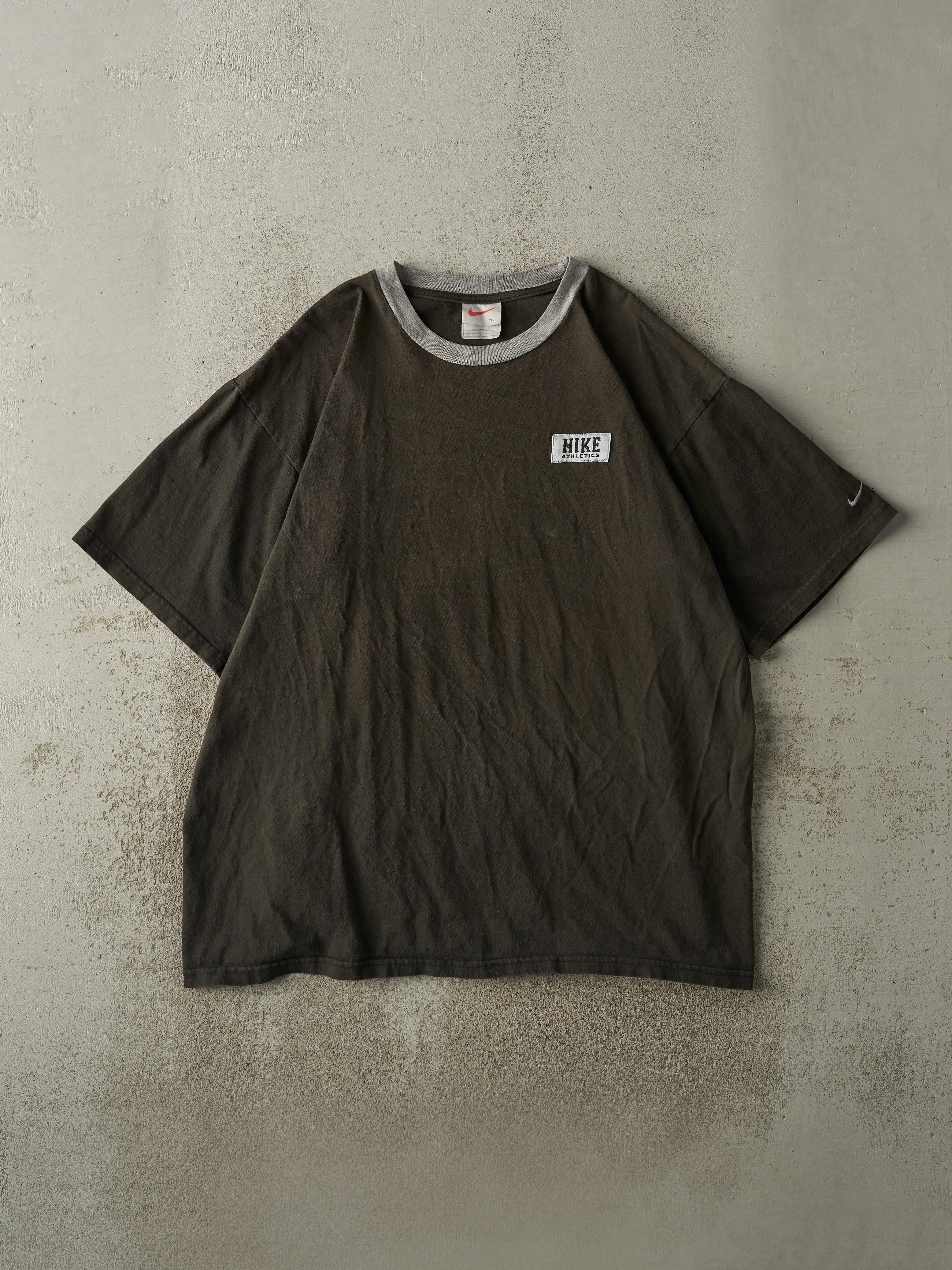 Vintage 90s Faded Black Nike Athletics Ringer Tee (L) sold by Rebalance Vintage