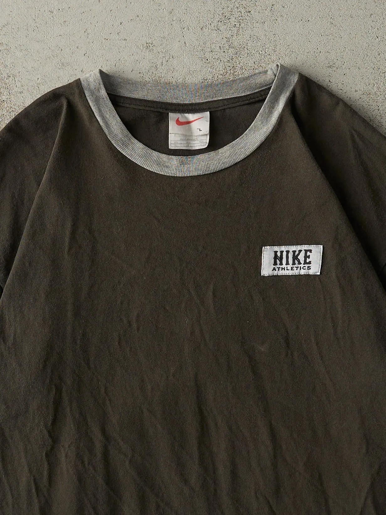 Vintage 90s Faded Black Nike Athletics Ringer Tee (L) sold by Rebalance Vintage product image thumbnail 2