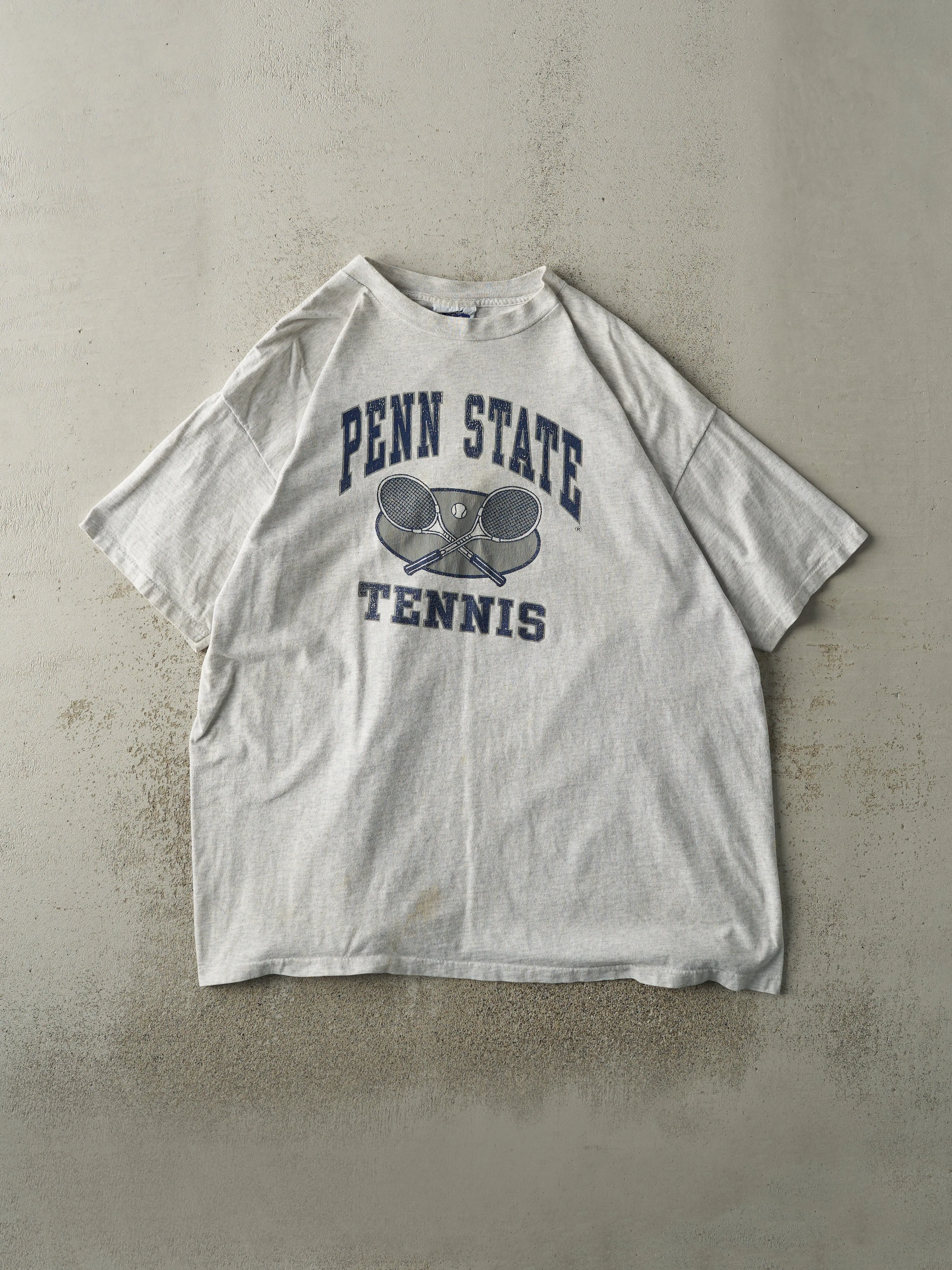 Vintage 90s Heather Grey Penn State Tennis Single Stitch Tee (L/XL) sold by Rebalance Vintage