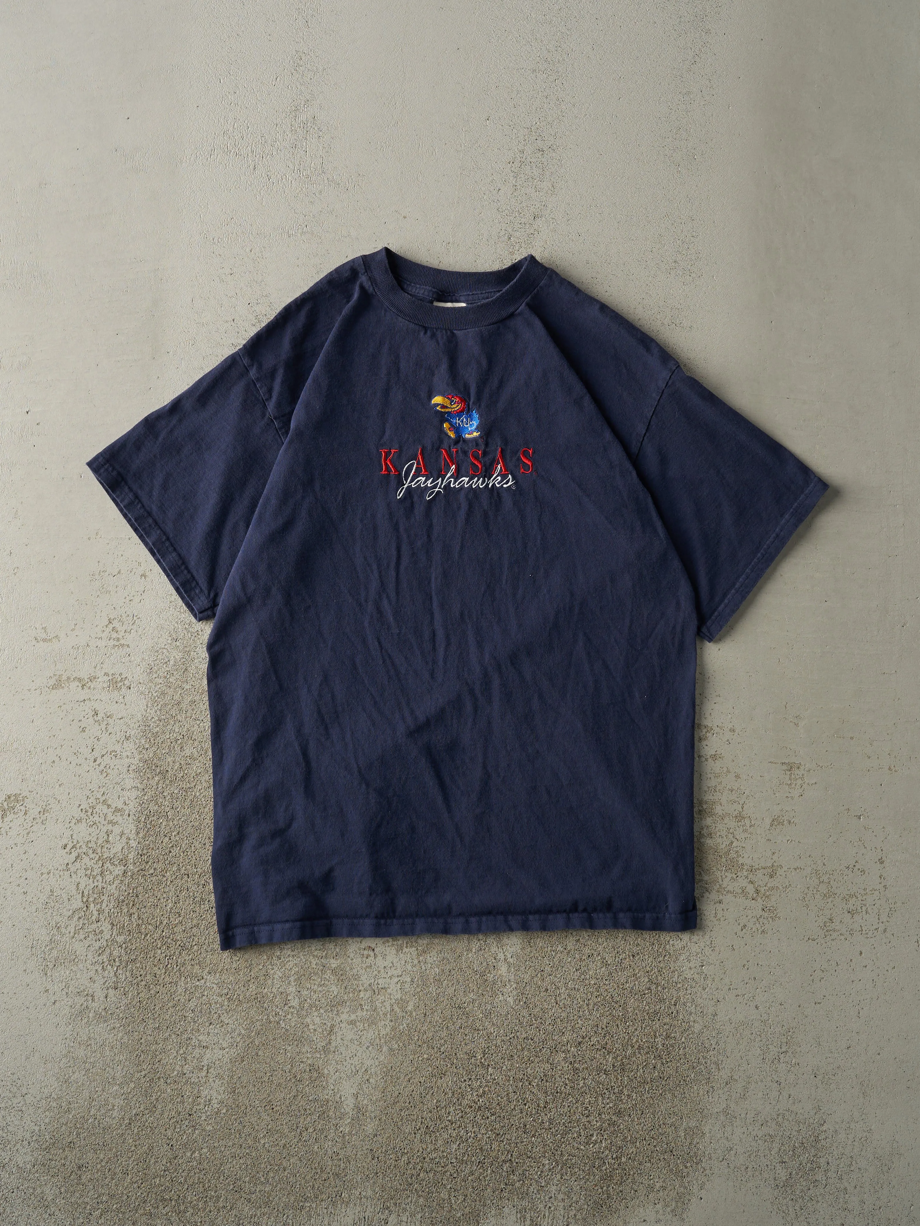 Vintage 90s Navy Blue Embroidered Kansas Jayhawks Tee (M) sold by Rebalance Vintage
