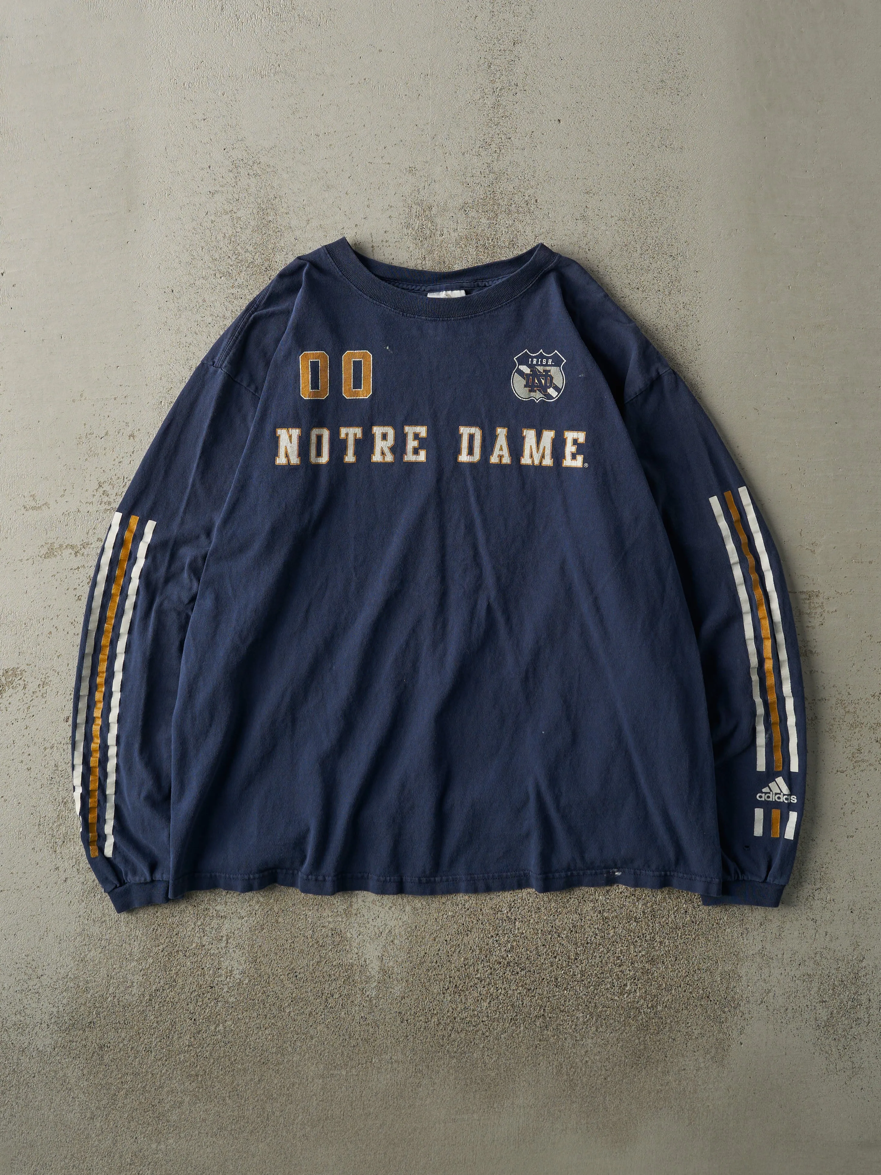 Vintage Y2K Navy Blue Adidas Notre Dame Long Sleeve (L) sold by Rebalance Vintage