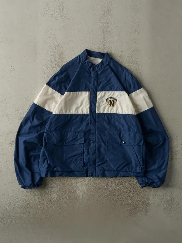 Vintage 90s Navy Blue & White Notre Dame Windbreaker Jacket (L) sold by Rebalance Vintage