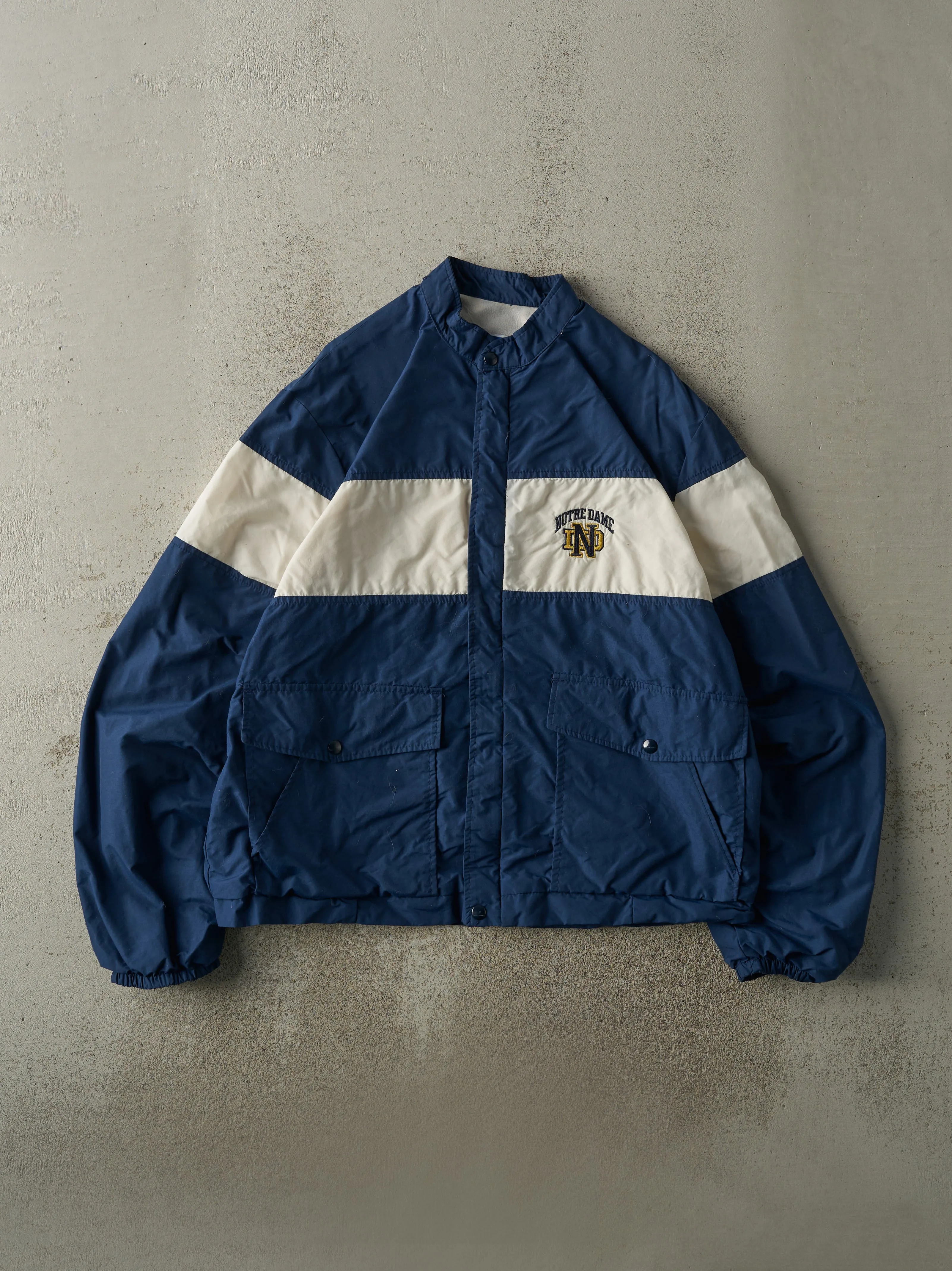Vintage 90s Navy Blue & White Notre Dame Windbreaker Jacket (L) sold by Rebalance Vintage