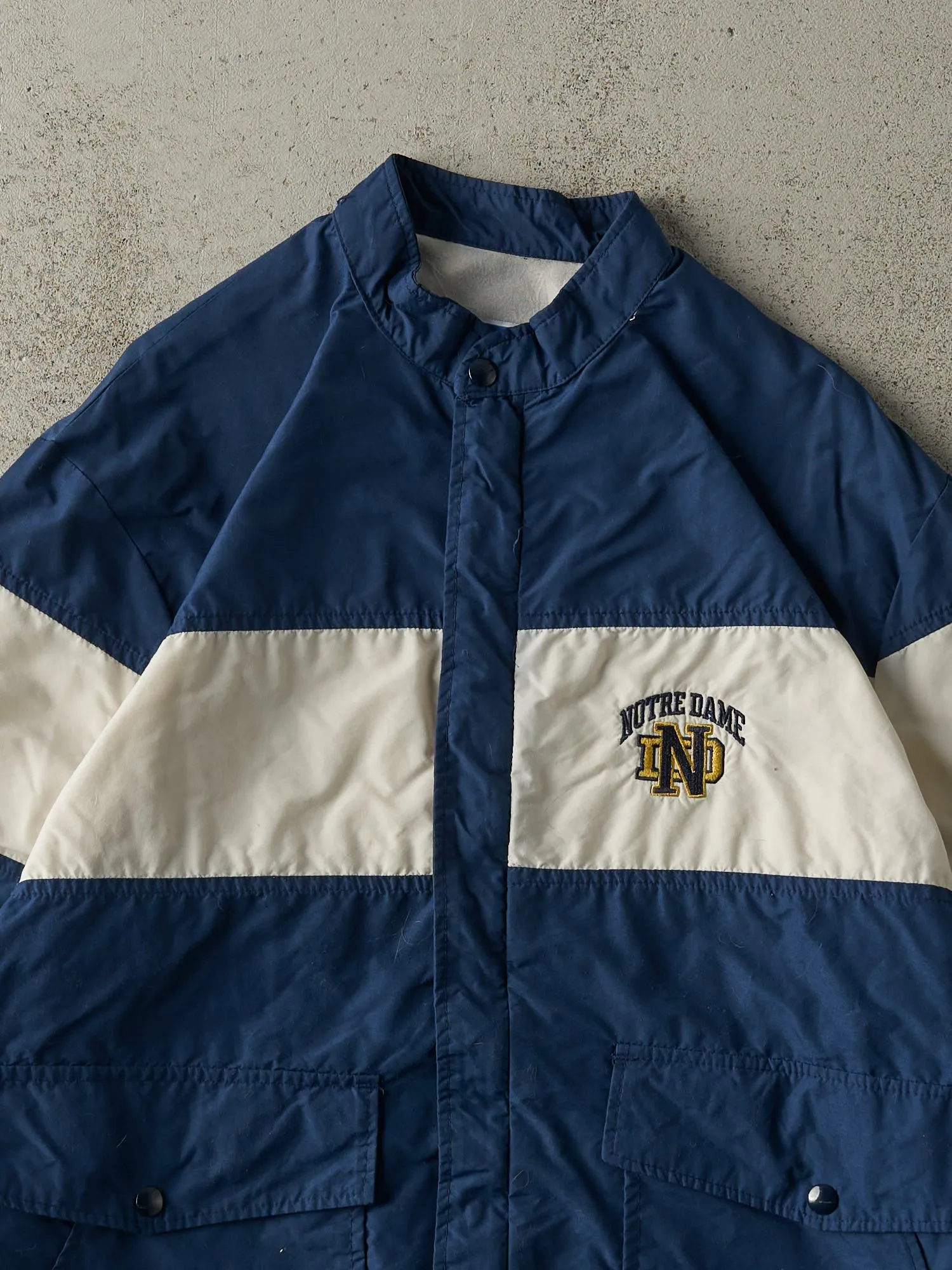 Vintage 90s Navy Blue & White Notre Dame Windbreaker Jacket (L) sold by Rebalance Vintage product image thumbnail 2