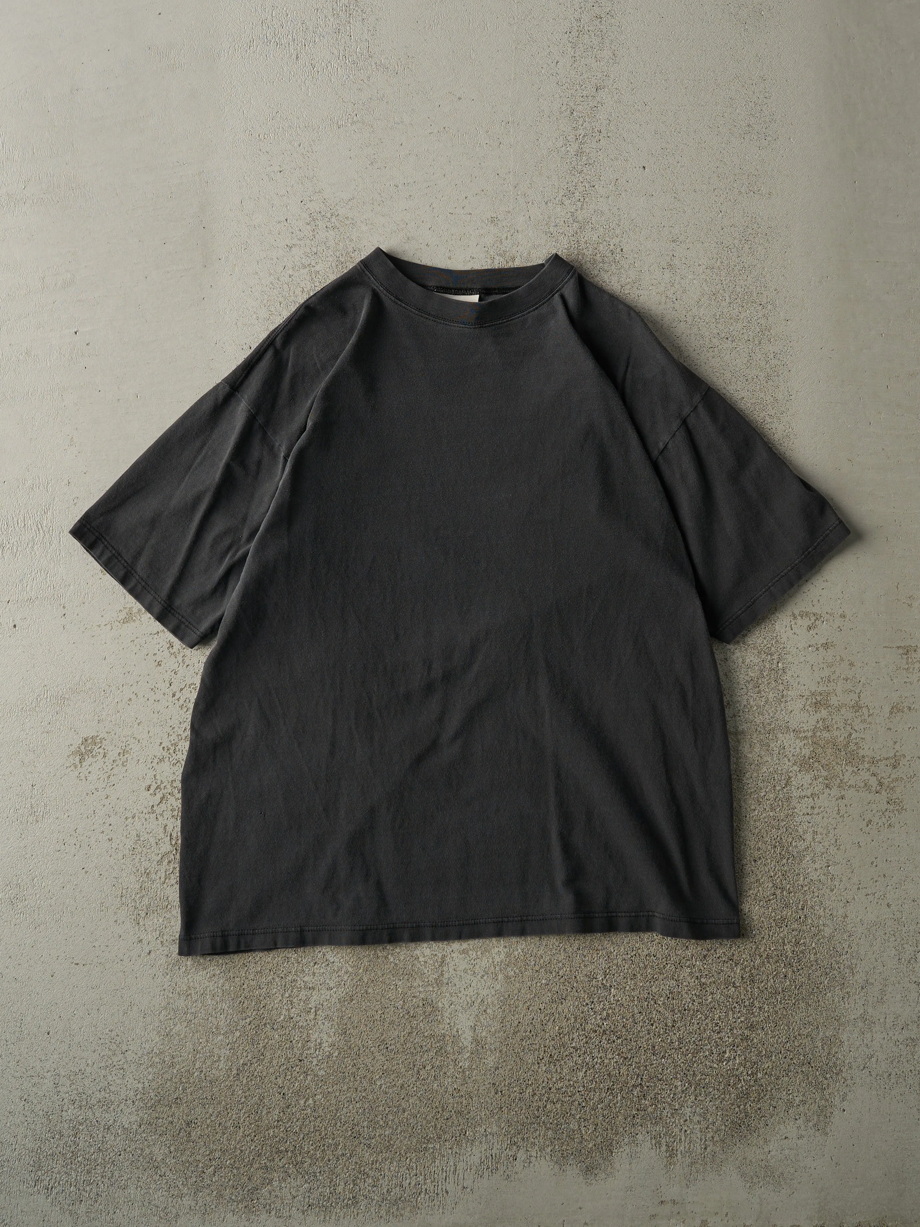 Vintage 90s Faded Black Blank Tee (L) sold by Rebalance Vintage