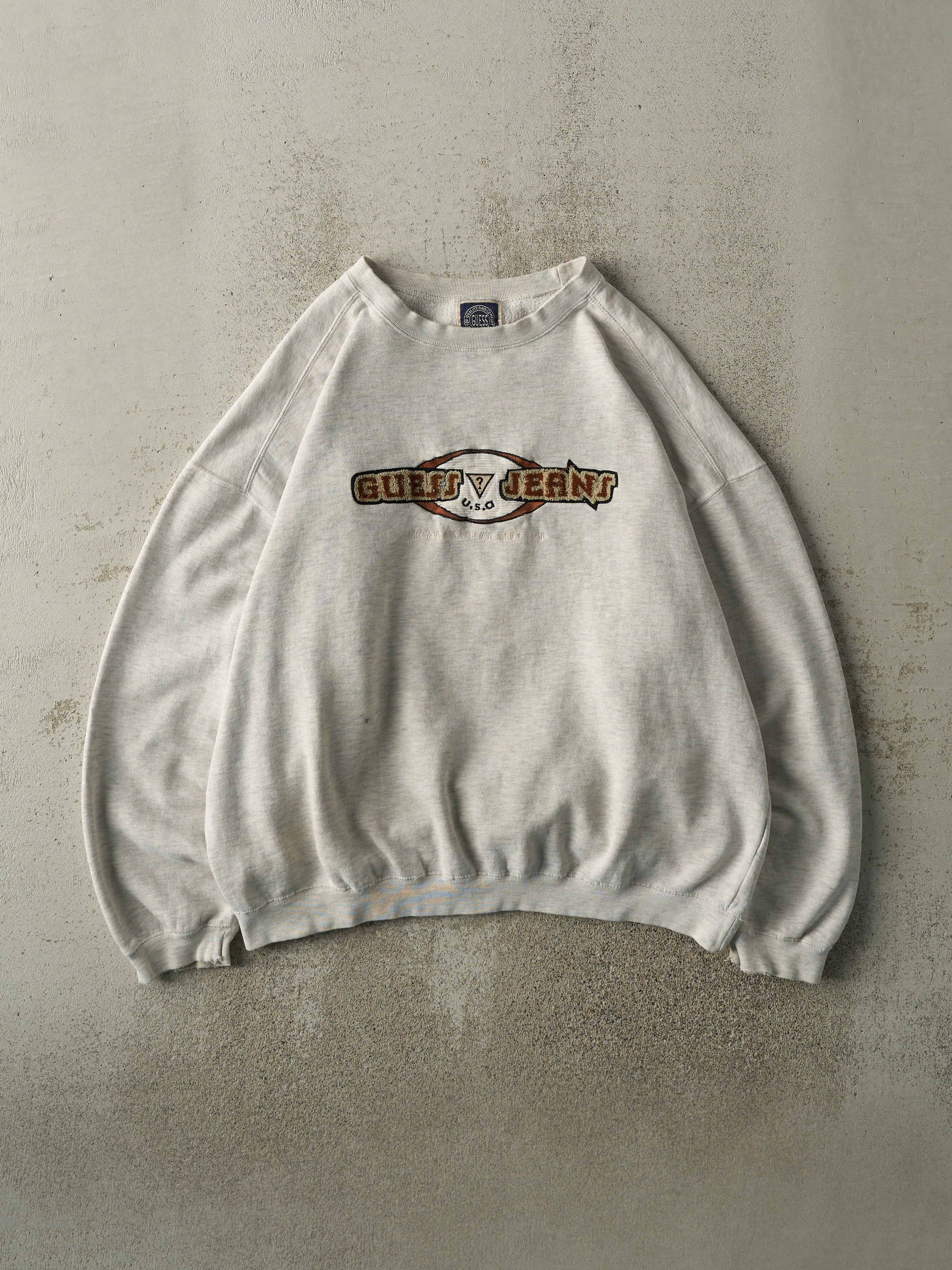 Vintage 90s Heather Grey Guess Jeans Embroidered Boxy Crewneck (L) sold by Rebalance Vintage