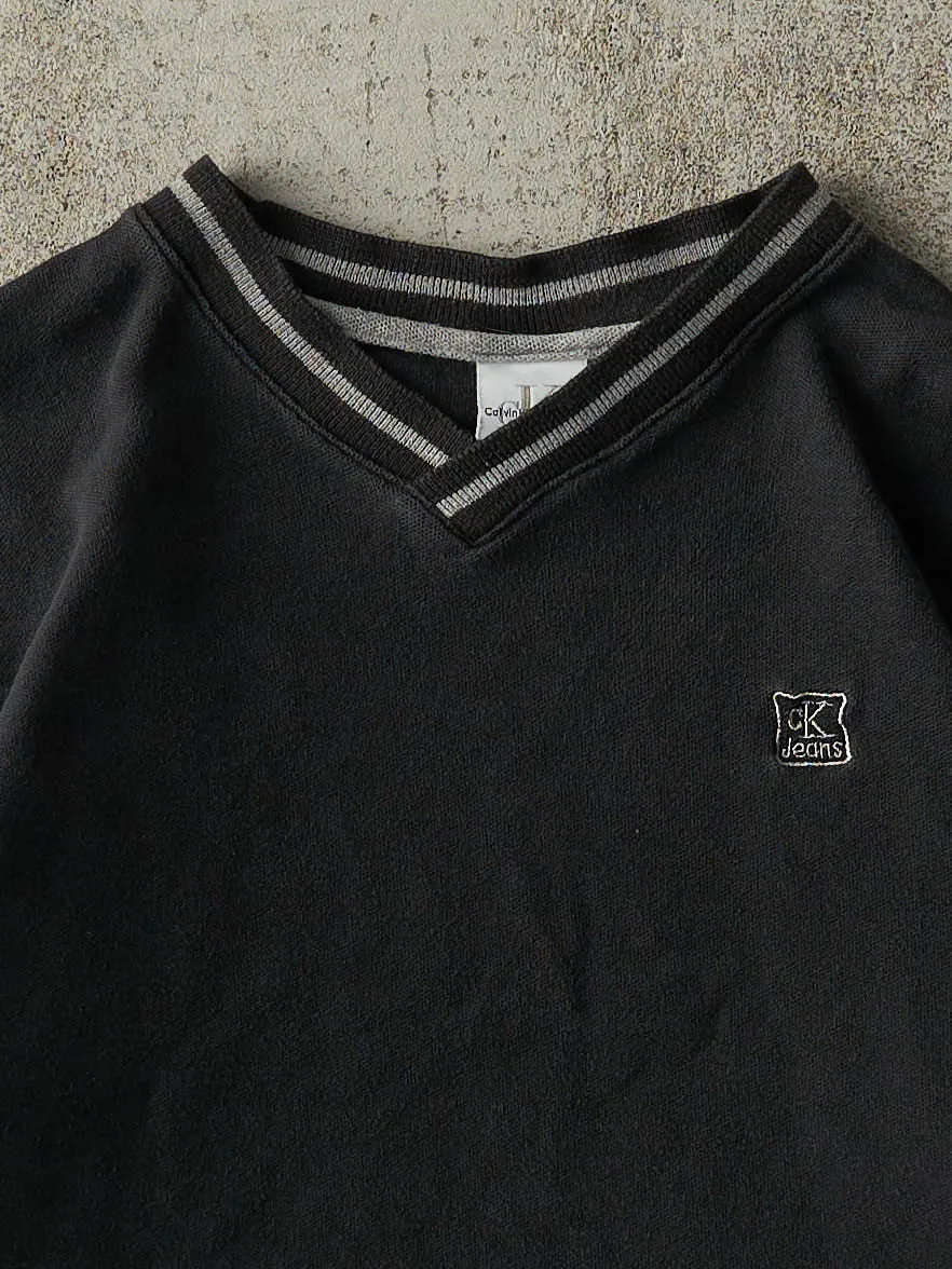 Vintage 90s Faded Black Calvin Klein Jeans Embroidered Boxy Shirt (S/M) sold by Rebalance Vintage product image thumbnail 2