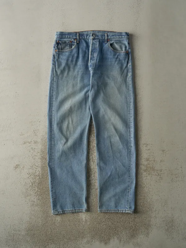 Vintage 90s Light Wash Levi's 501 Jeans (35x31) sold by Rebalance Vintage