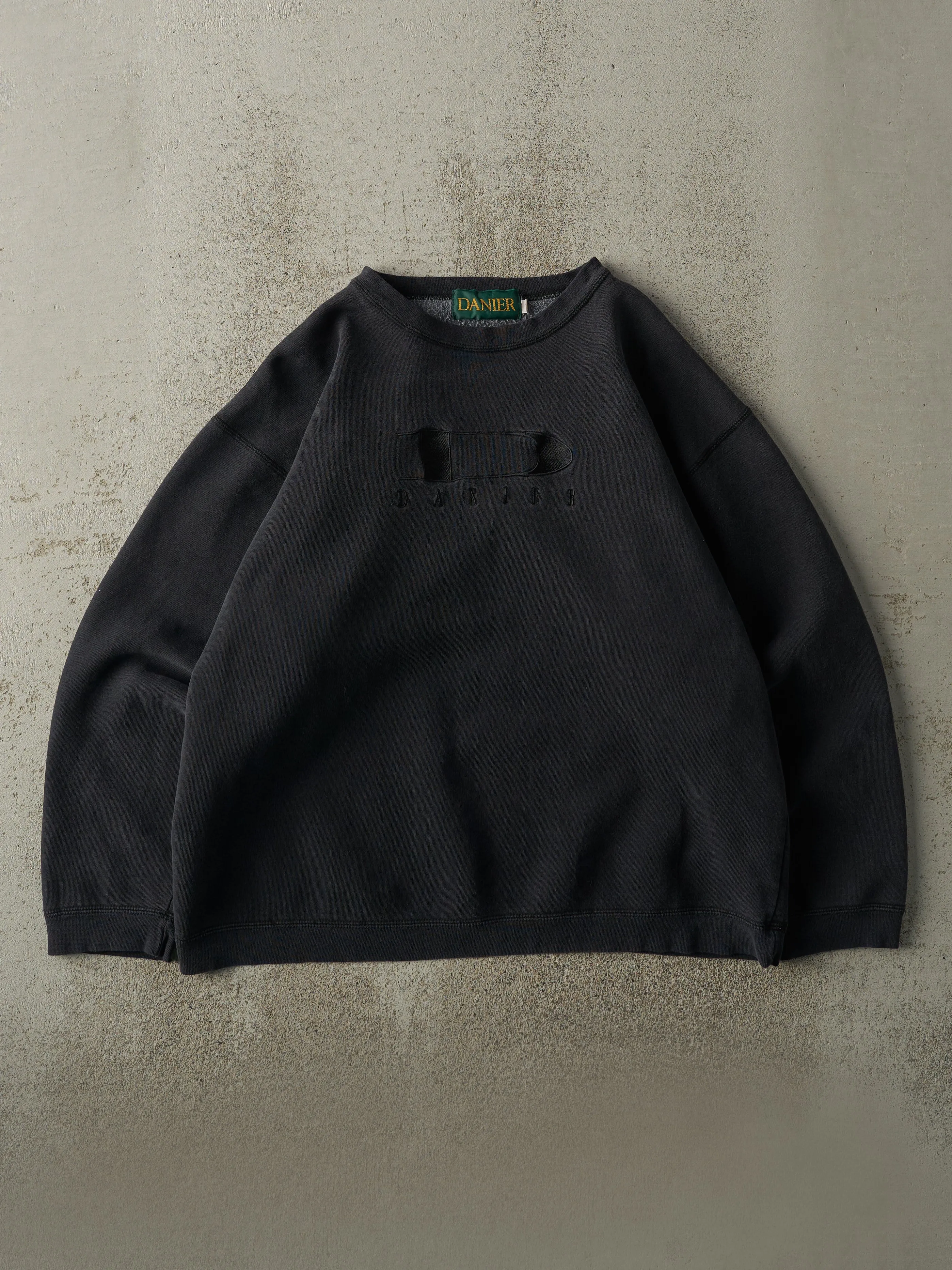 Vintage 90s Faded Black Danier Embroidered Logo Crewneck (M/L) sold by Rebalance Vintage