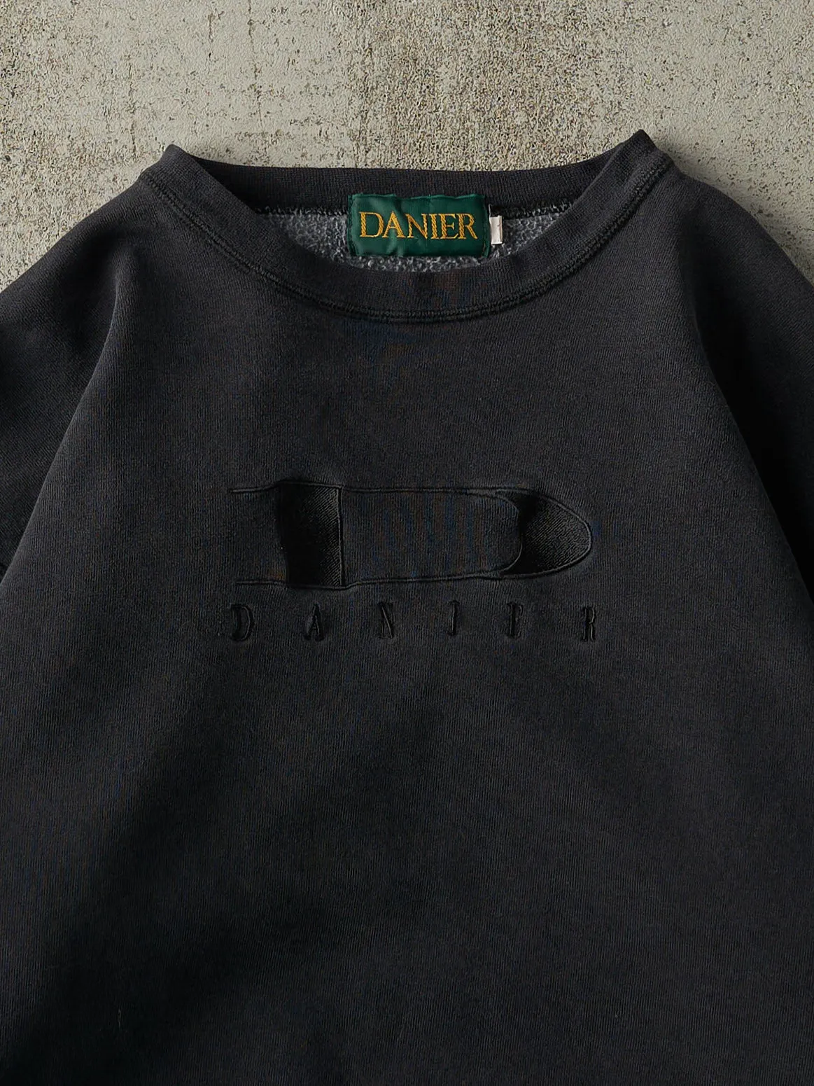Vintage 90s Faded Black Danier Embroidered Logo Crewneck (M/L) sold by Rebalance Vintage product image thumbnail 2