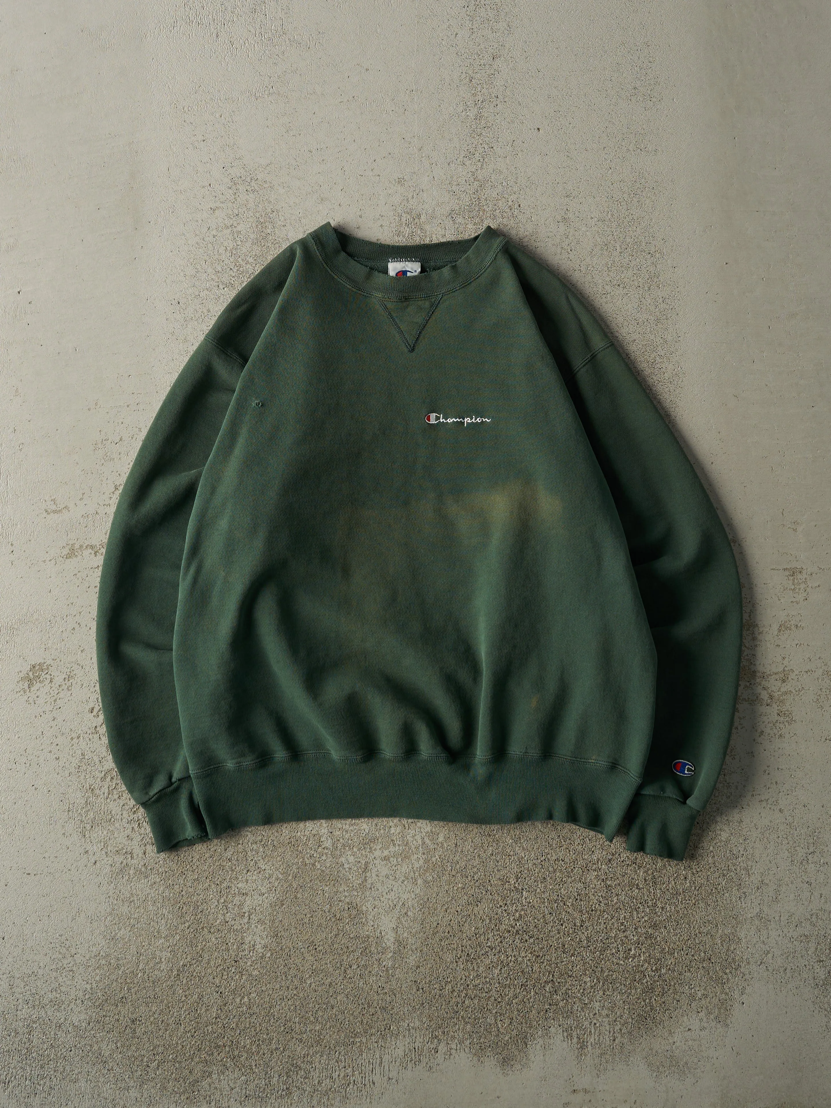 Vintage 90s Sun Faded Green Champion Crewneck (L/XL) sold by Rebalance Vintage