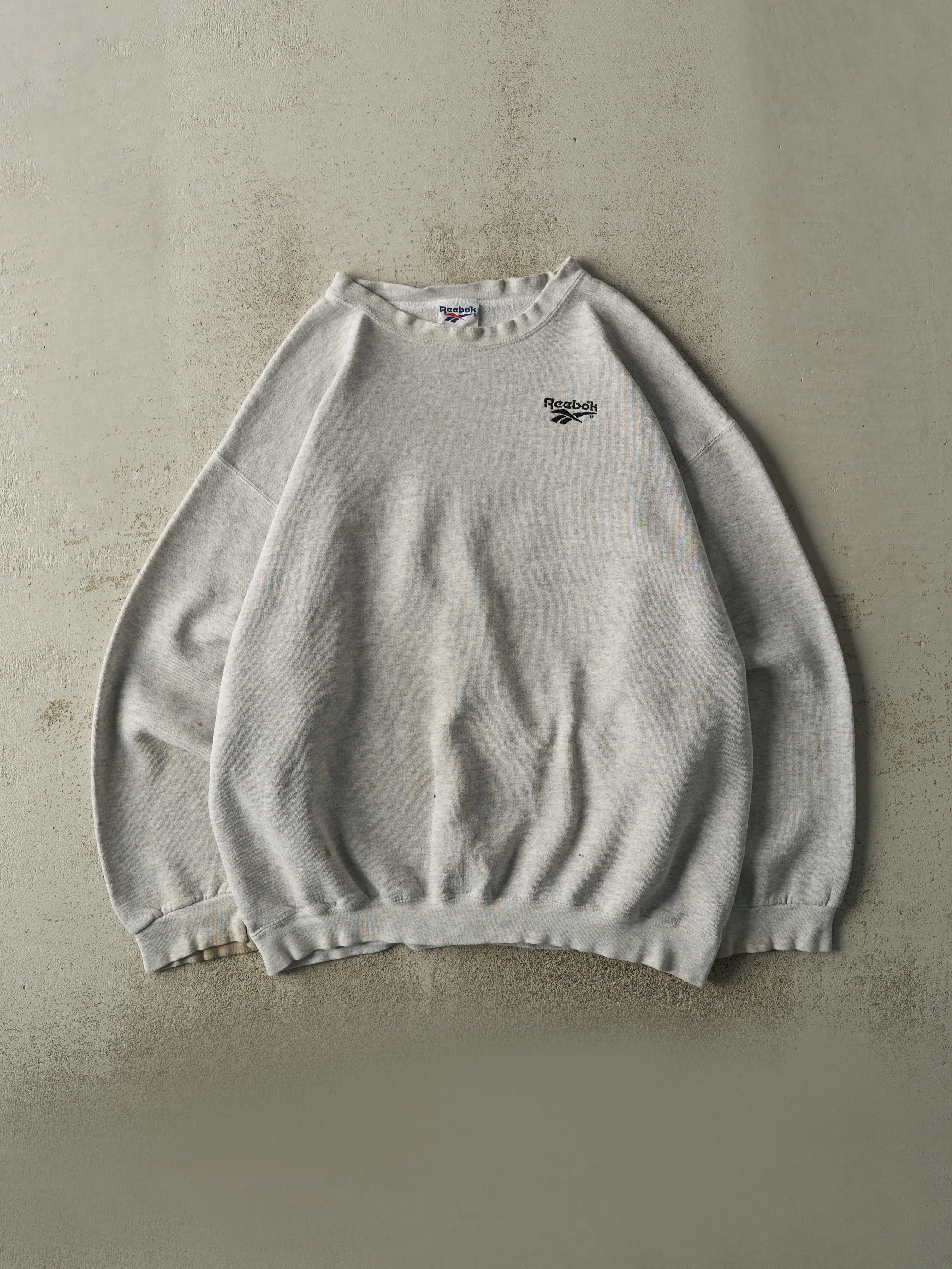 Vintage 90s Heather Grey Reebok Embroidered Crewneck (XL/XXL) sold by Rebalance Vintage