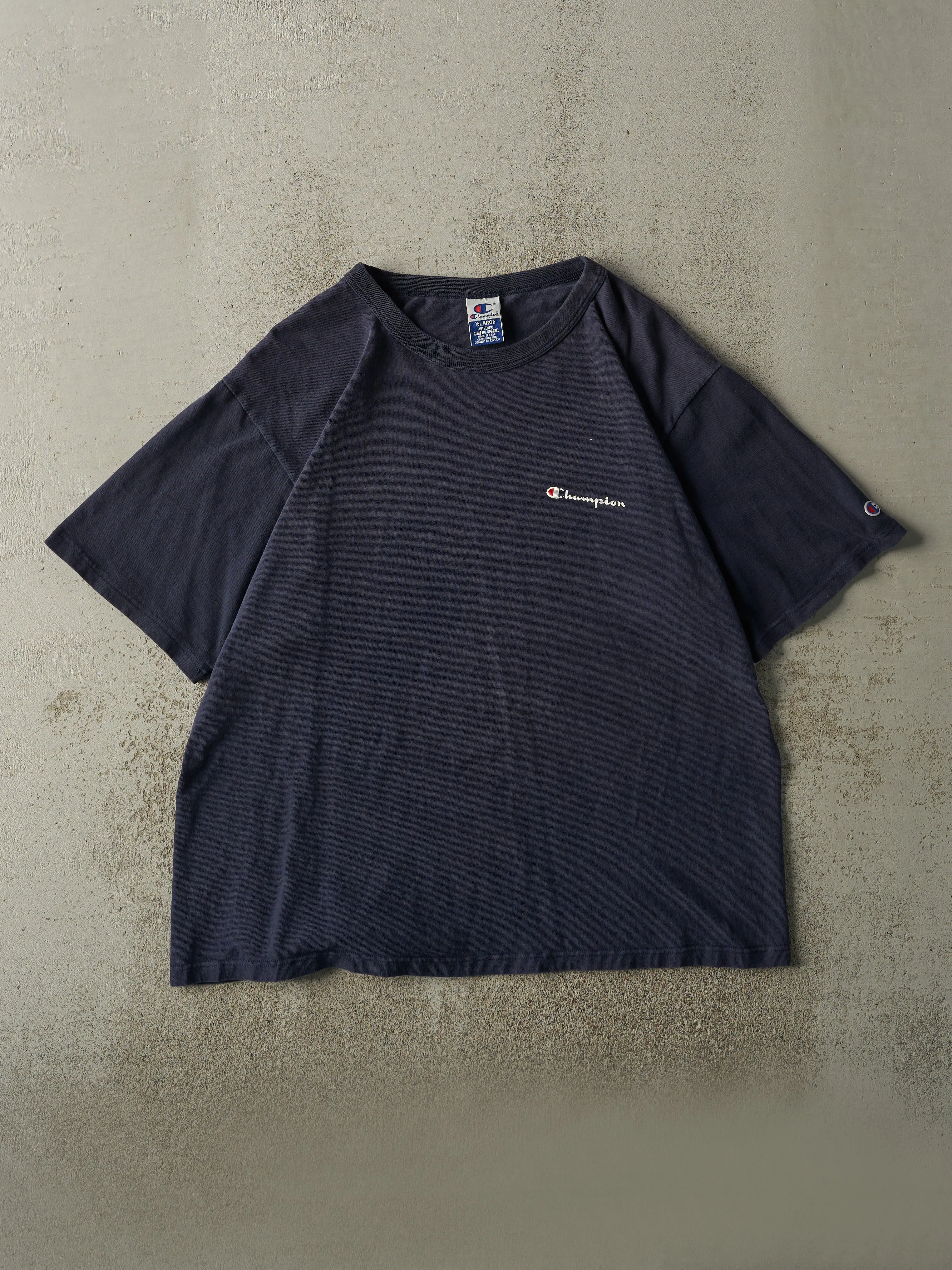 Vintage 90s Navy Blue Champion Logo Tee (XL) sold by Rebalance Vintage