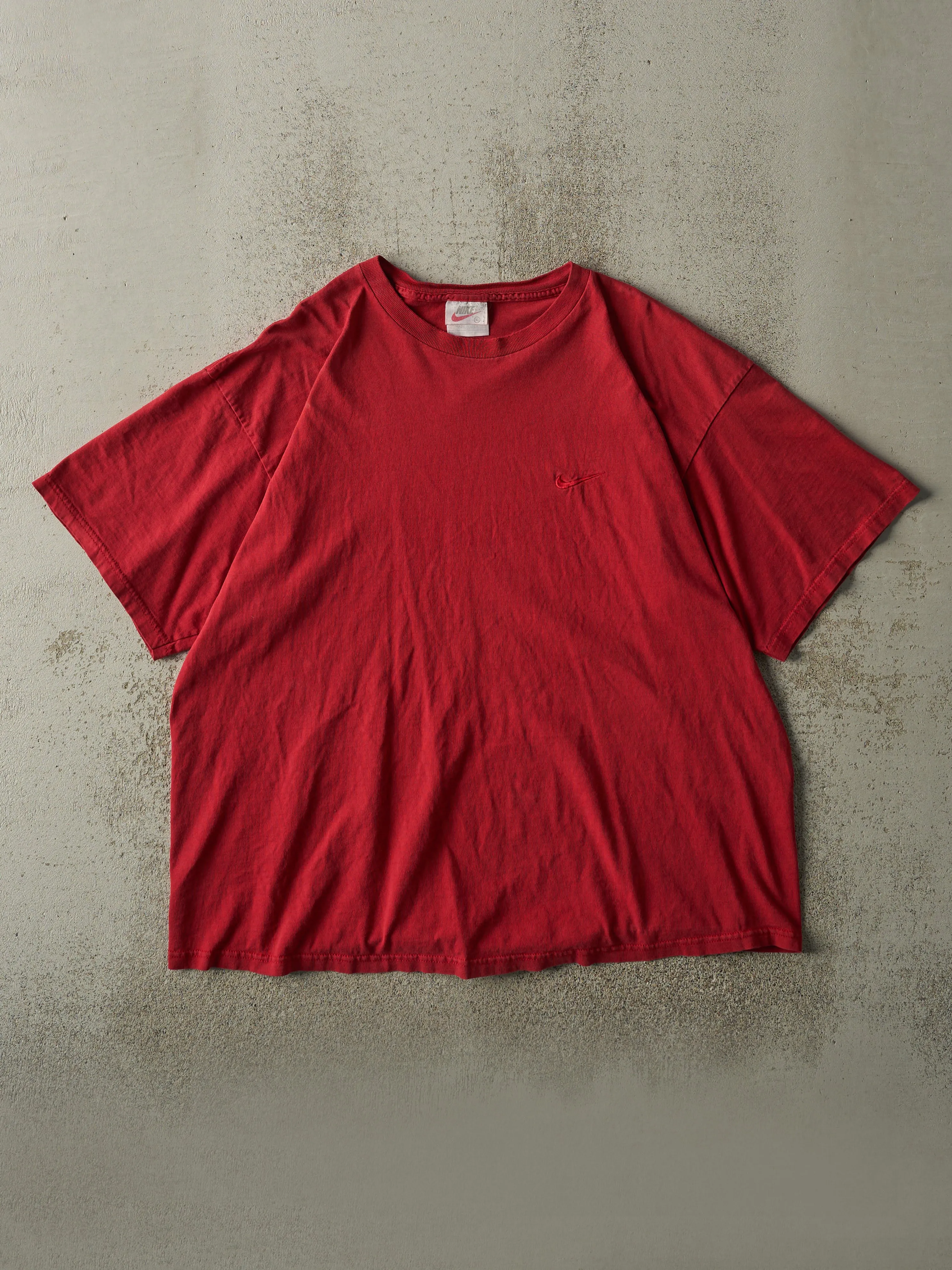 Vintage 90s Red Nike Tonal Swoosh Tee (L/XL) sold by Rebalance Vintage