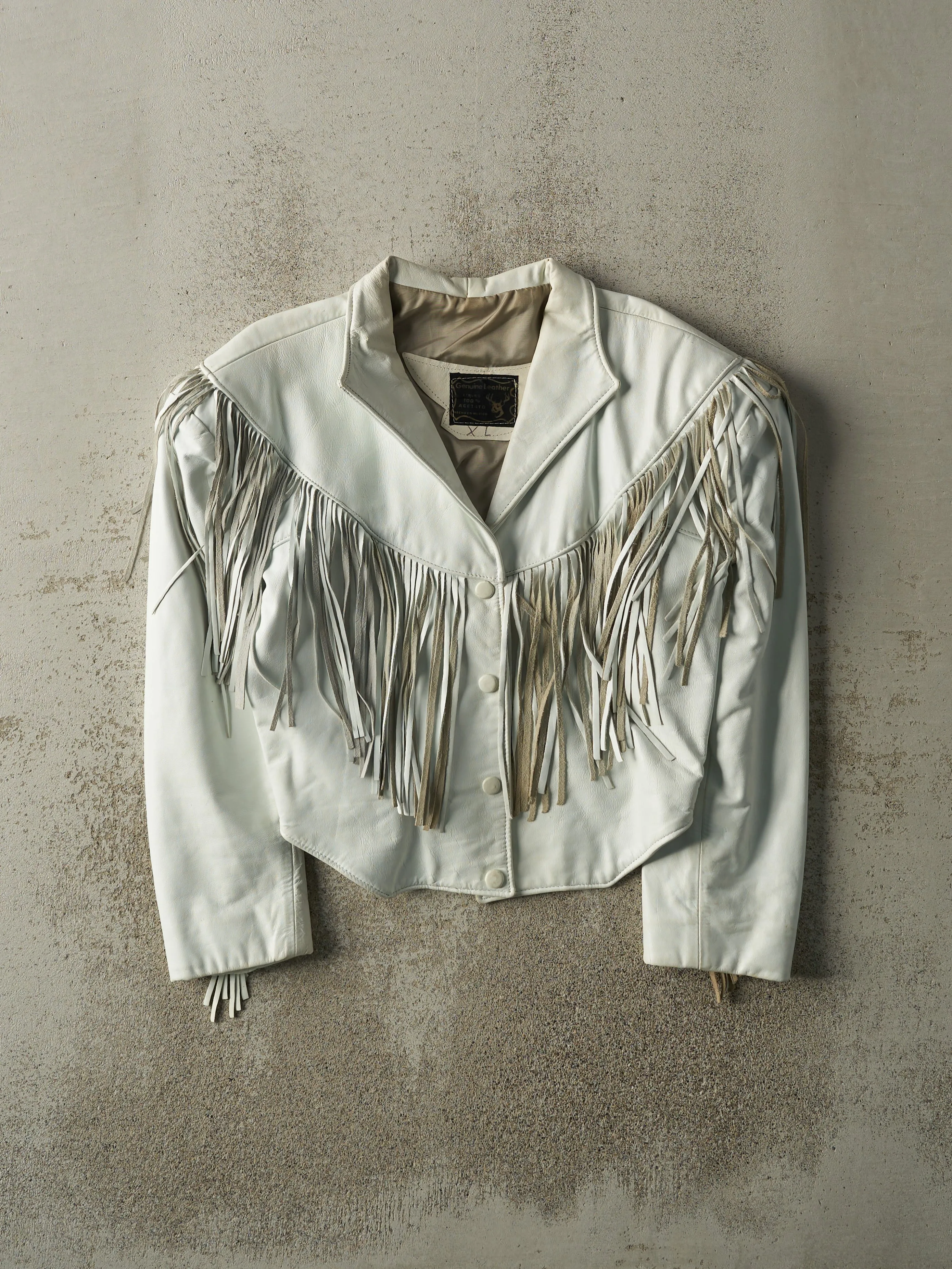 Vintage 80s White Leather Tassel Jacket (XS) sold by Rebalance Vintage