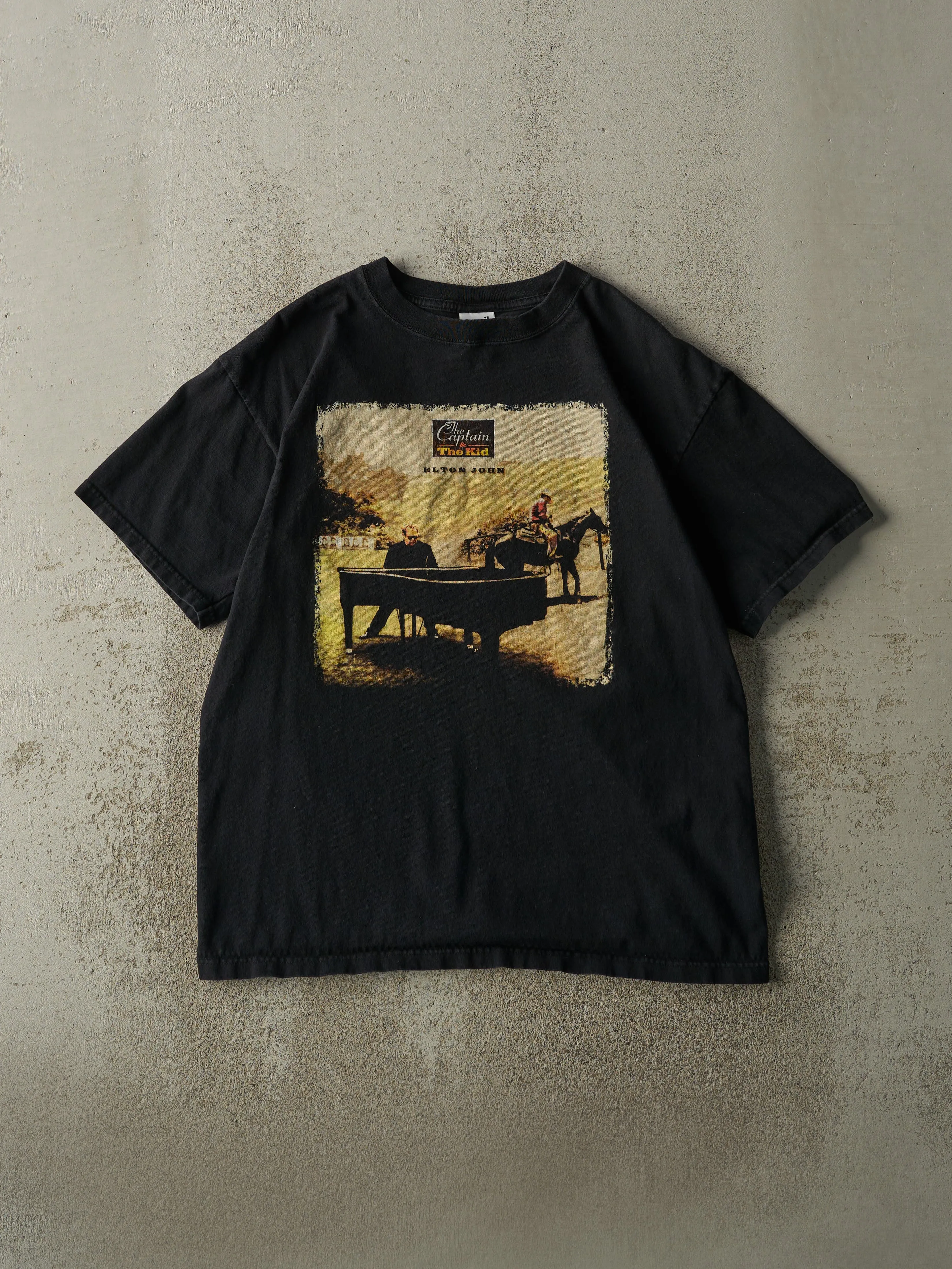 Vintage 06' Black Elton John Western Tour Tee (M/L) sold by Rebalance Vintage