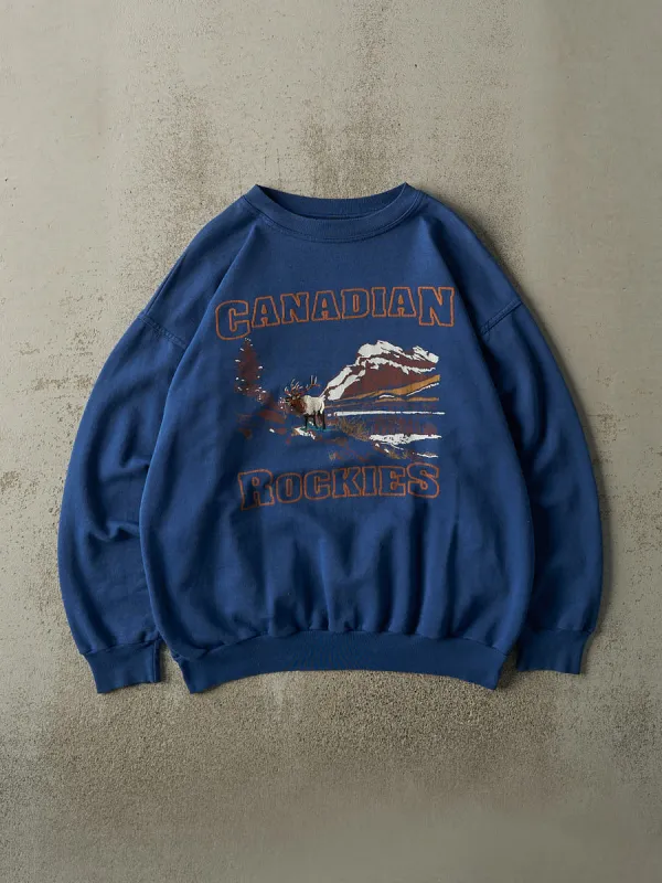 Vintage 90s Royal Blue Canadian Rockies Crewneck (L) sold by Rebalance Vintage