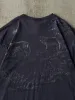 Vintage 90s Faded Navy Blue Wolf Tee (L/XL) sold by Rebalance Vintage