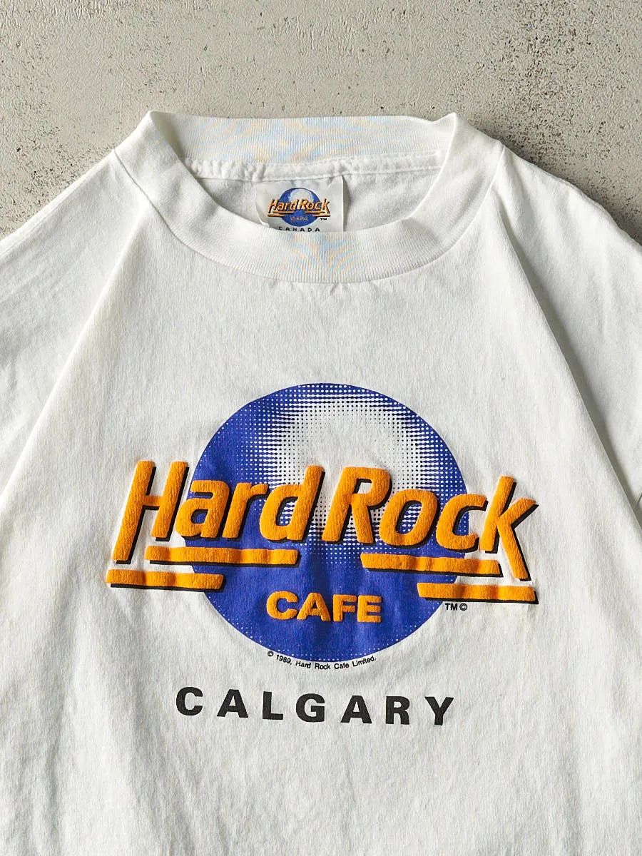 Vintage 89' White Hard Rock Cafe Calgary Puff Print Tee (L/XL) sold by Rebalance Vintage product image thumbnail 2